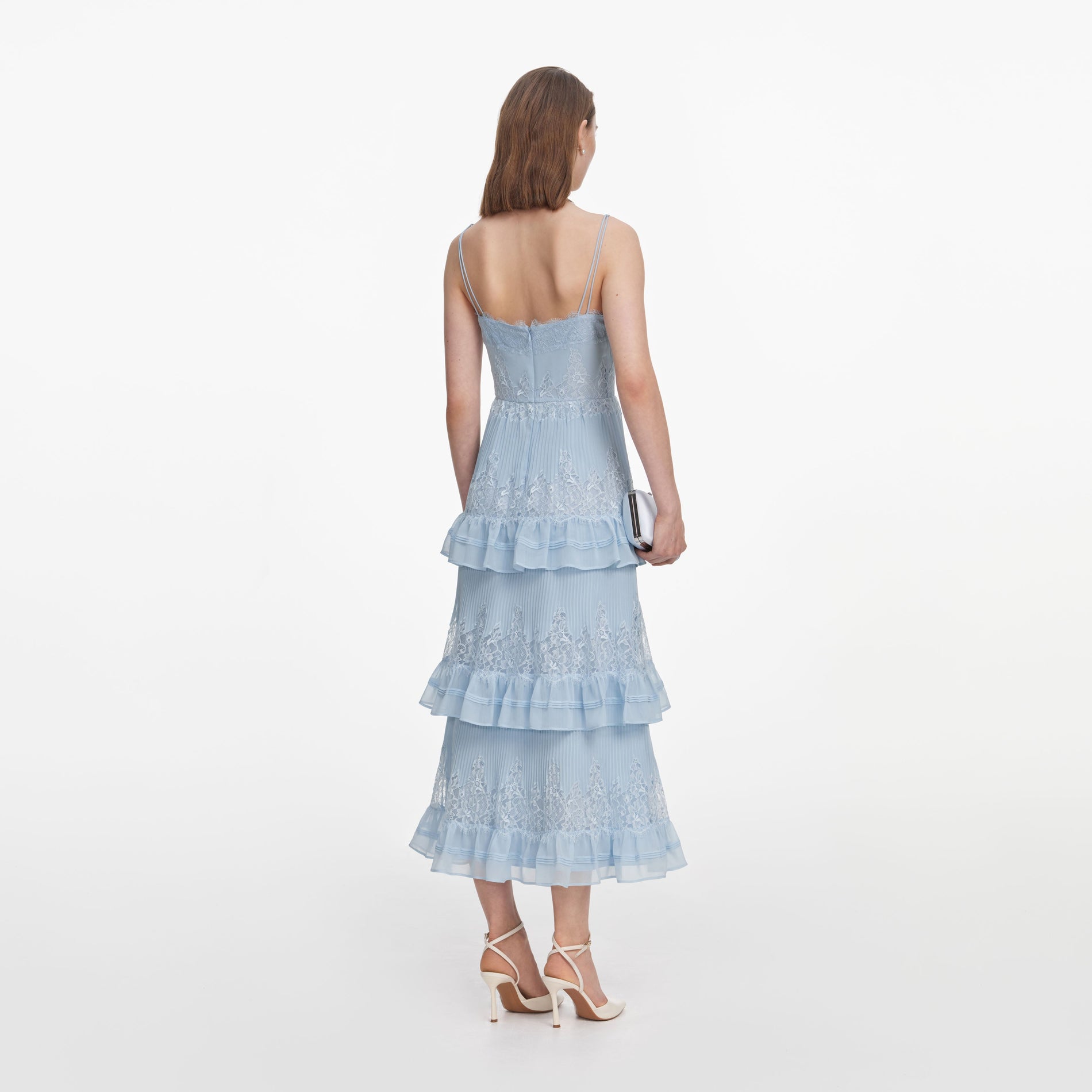 Back view of a woman wearing the Blue Chiffon Lace Tiered Midi Dress