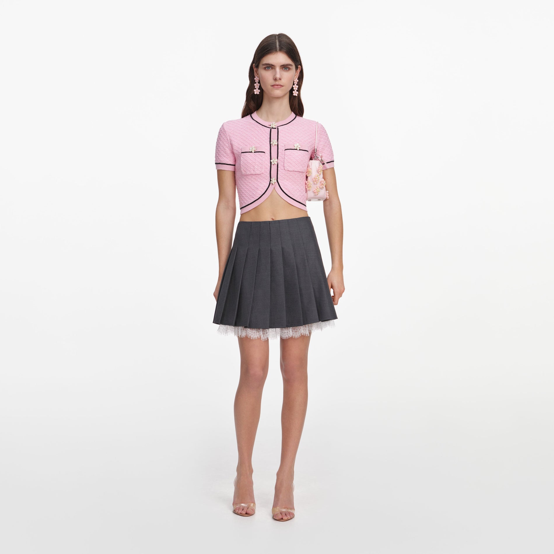 Front view of a woman wearing the Pink Flower Knit Top