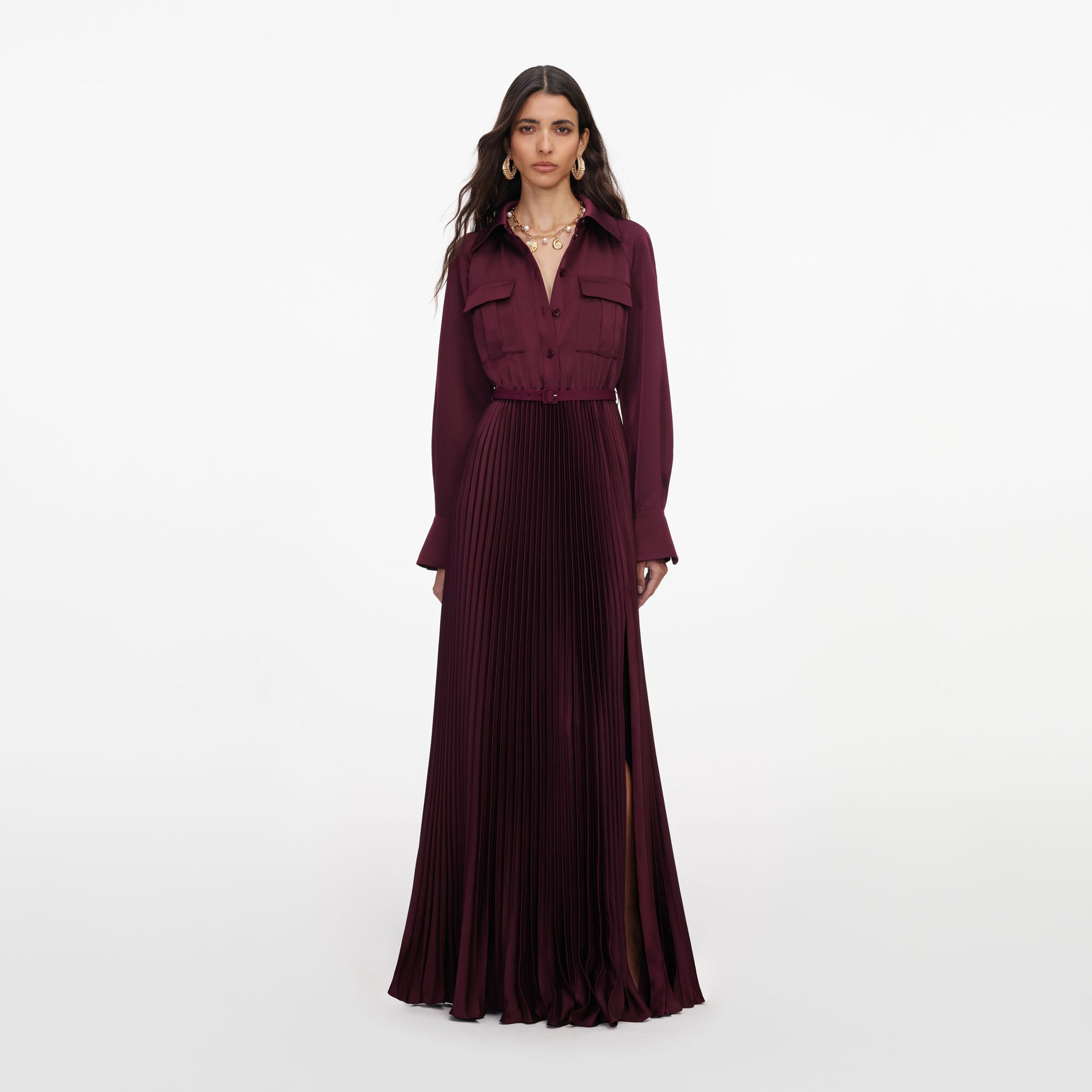 Front view of a woman wearing the Plum Satin Pleated Maxi Dress