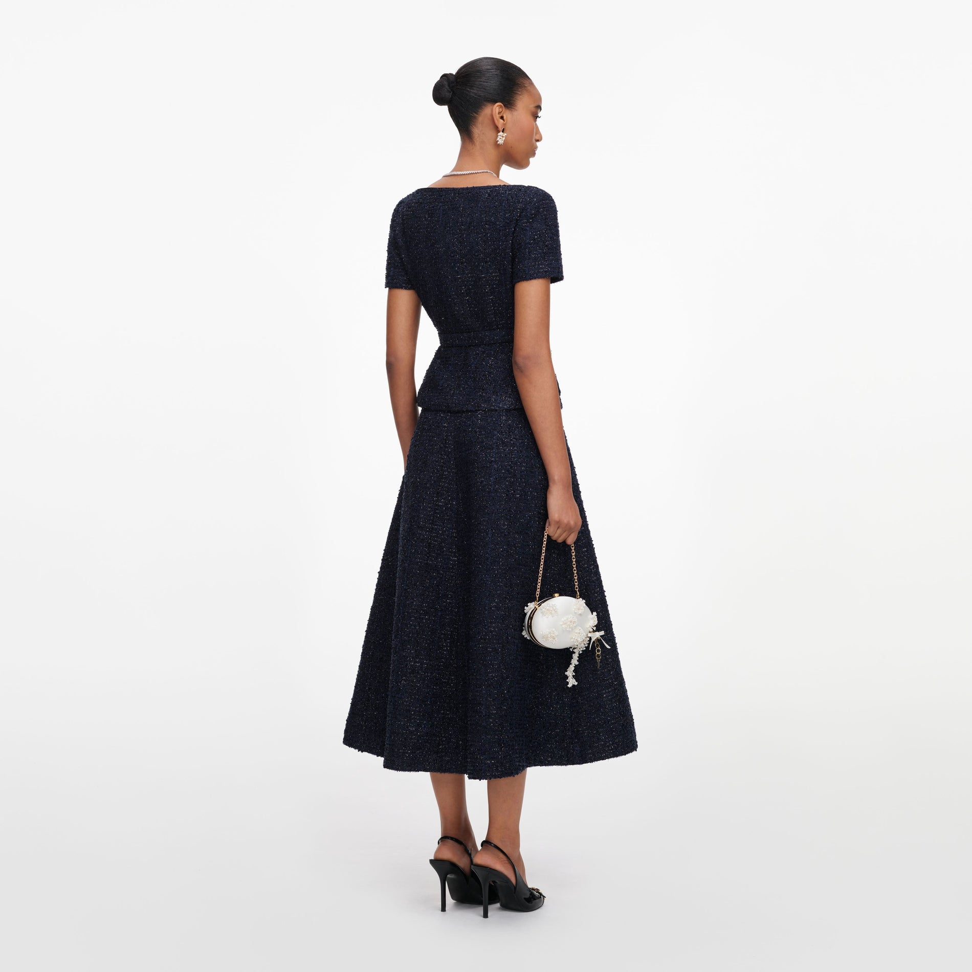 Back view of a woman wearing the Navy Boucle Tailored Midi Dress