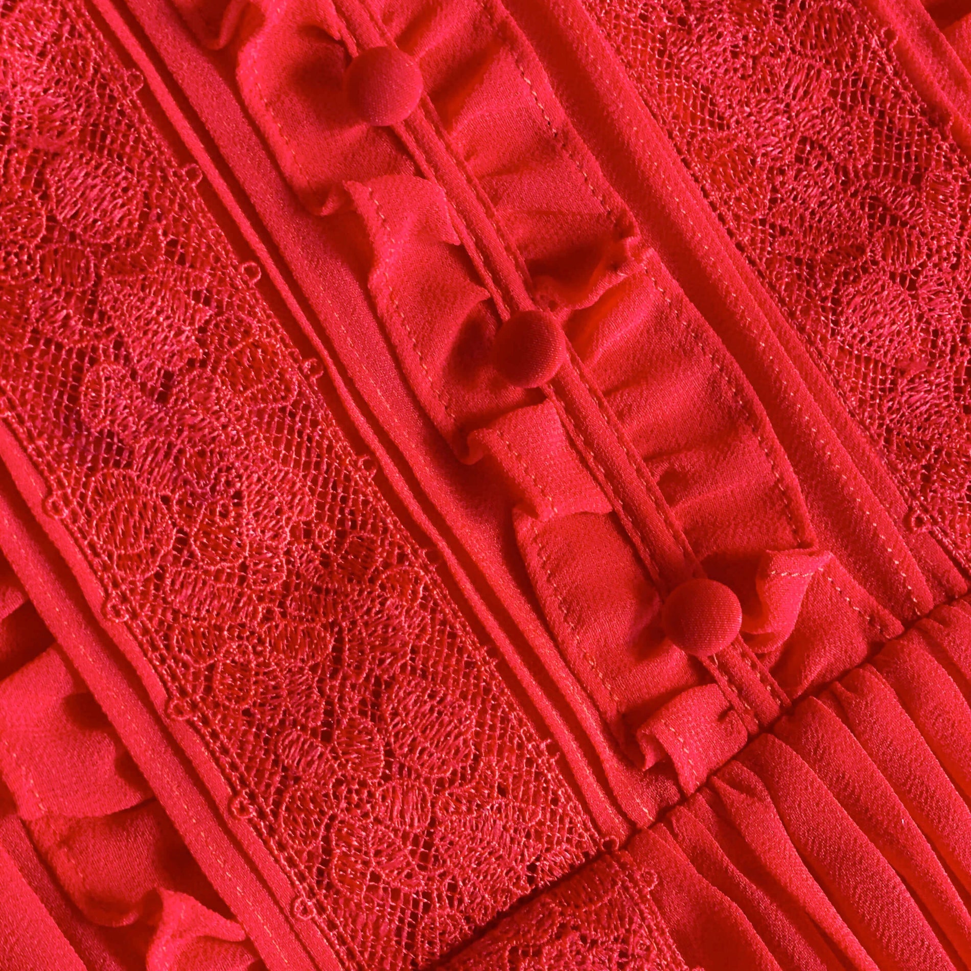 A close up of the fabric for the Red Chiffon Ruffle Mini Dress