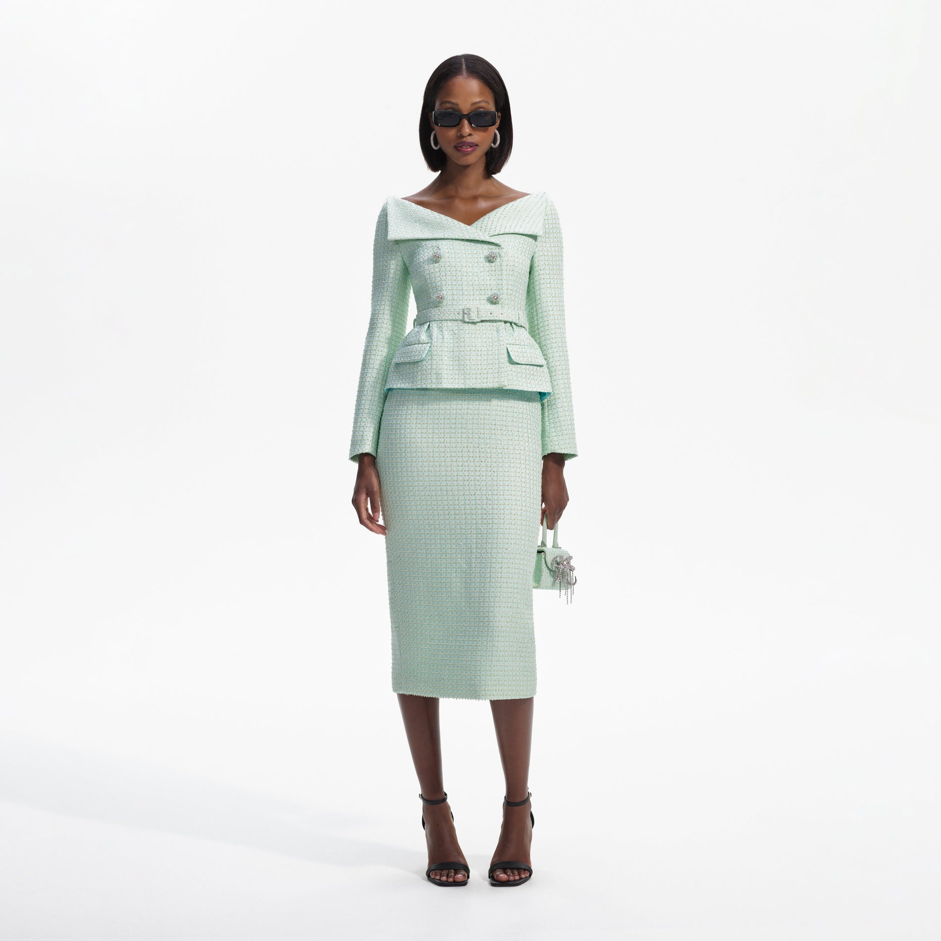 Front view of a woman wearing the Mint Boucle Tailored Midi Dress