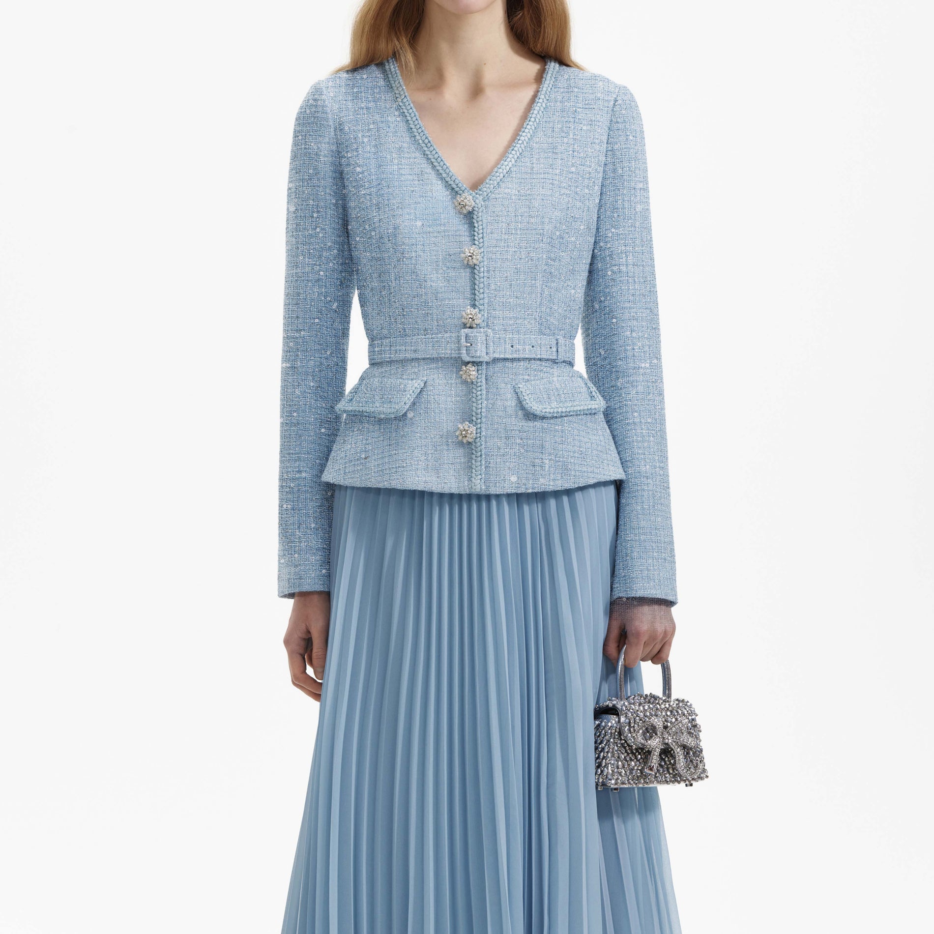 A close up of a woman wearing the Blue Boucle Tailored Midi Dress