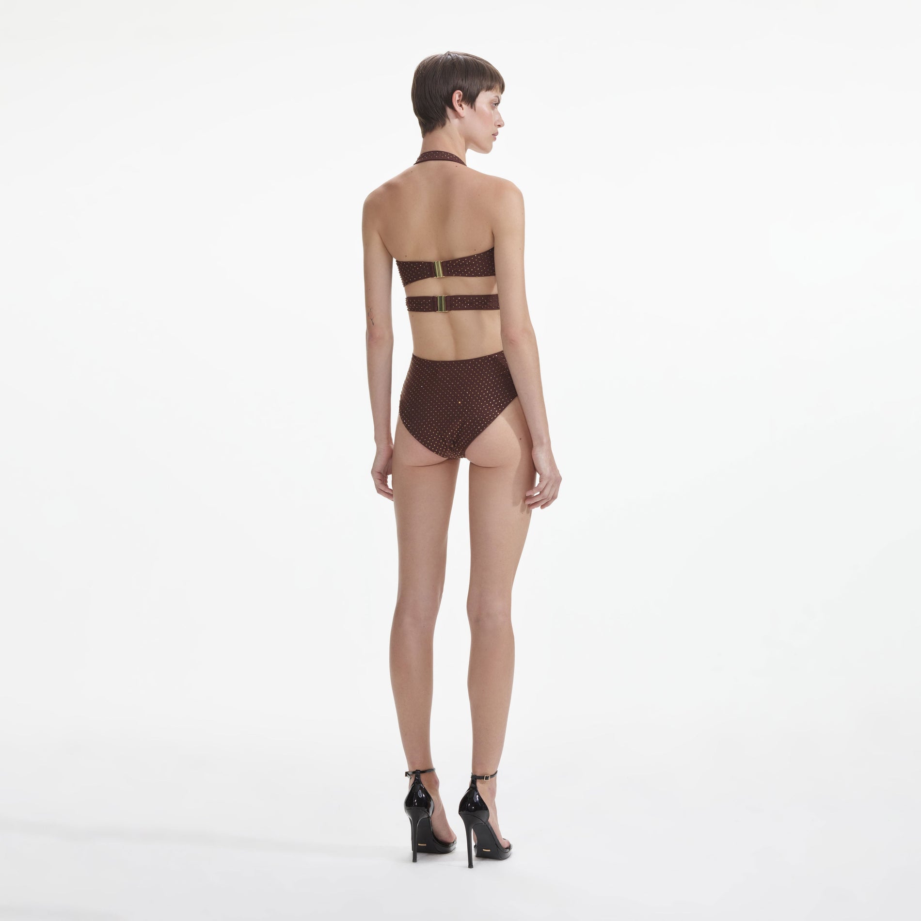 Back view of a woman wearing the Brown Rhinestone Swimsuit