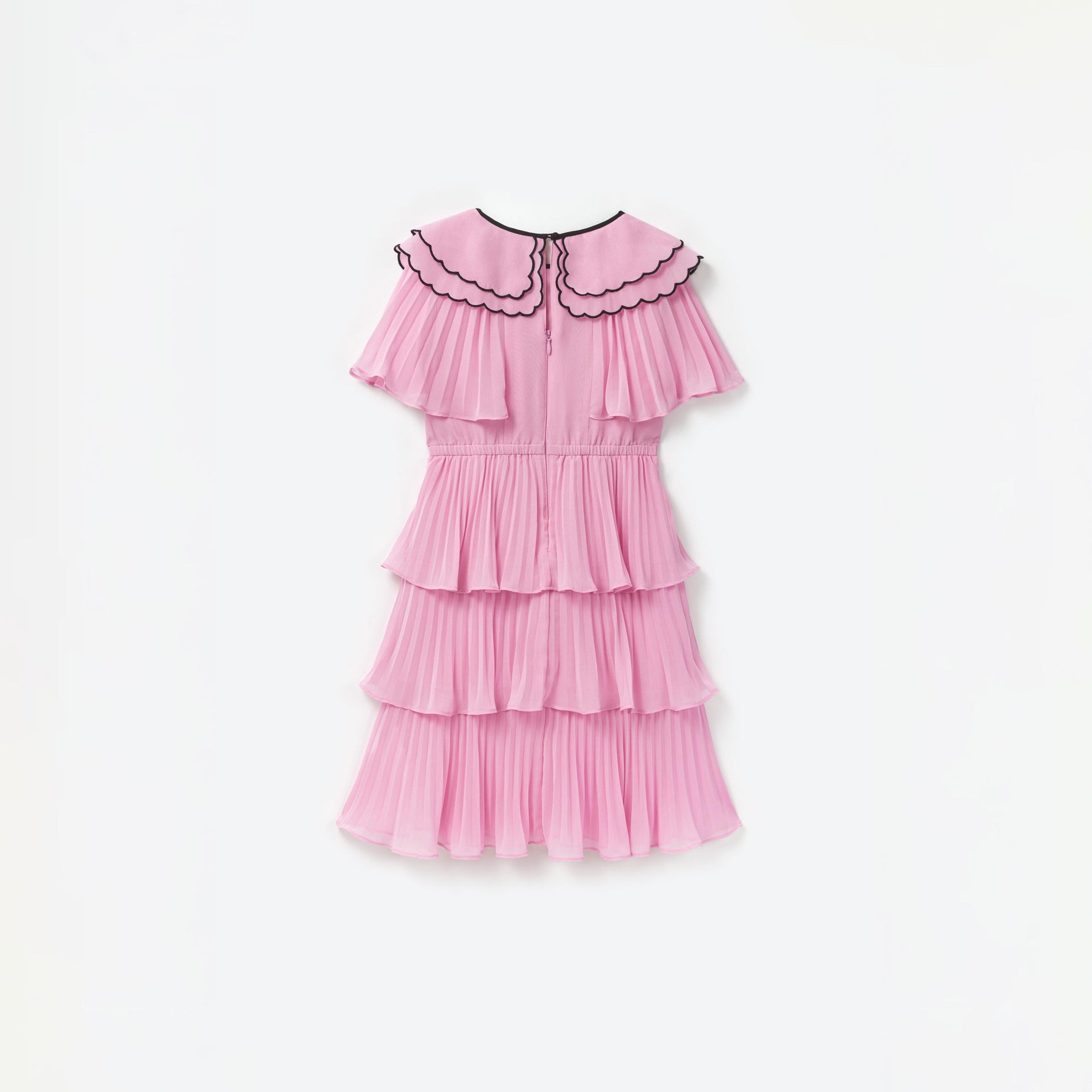 Side view of a woman wearing the Pink Scallop Collar Chiffon Dress