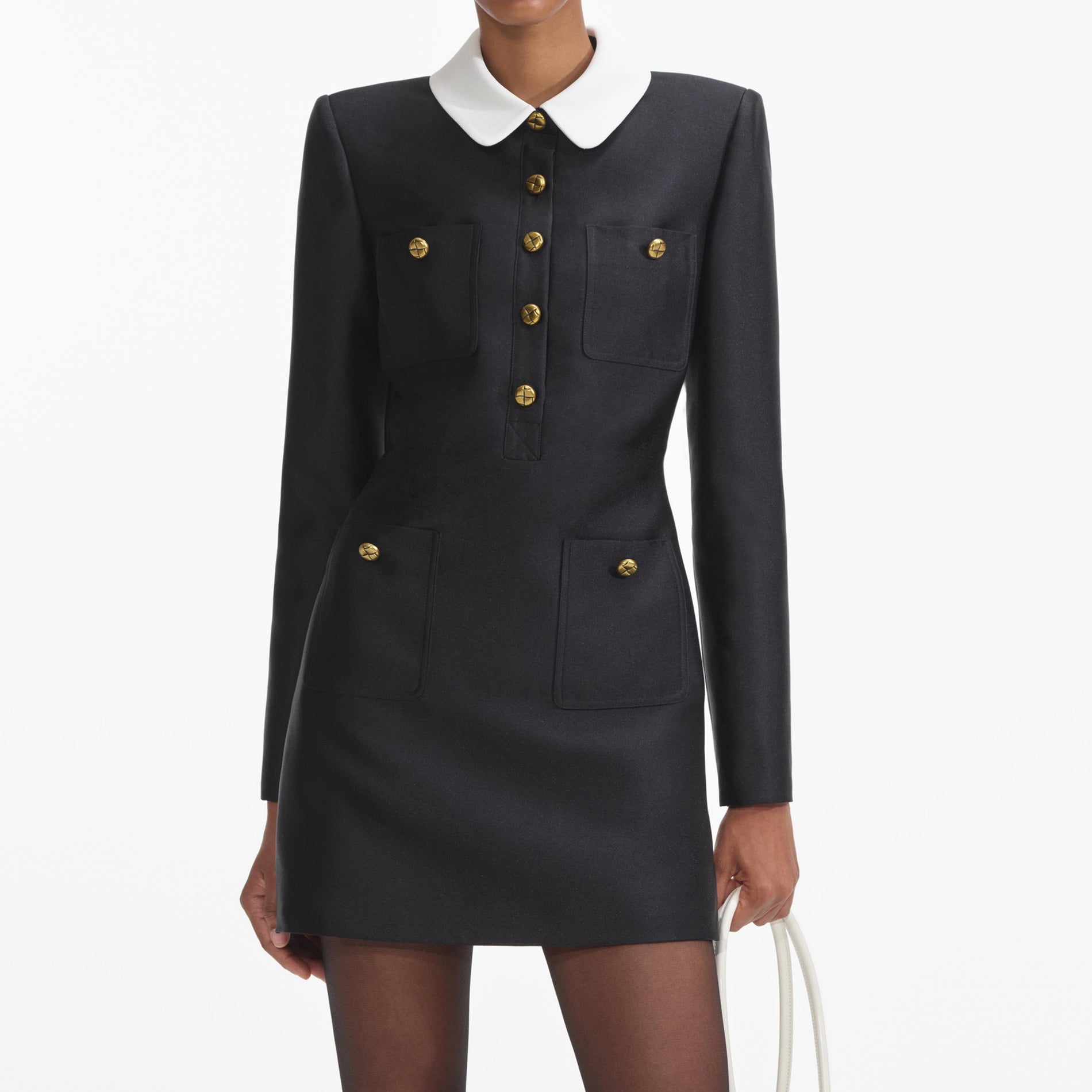 A close up of a woman wearing the Black Taffeta Contrast Collar Mini Dress