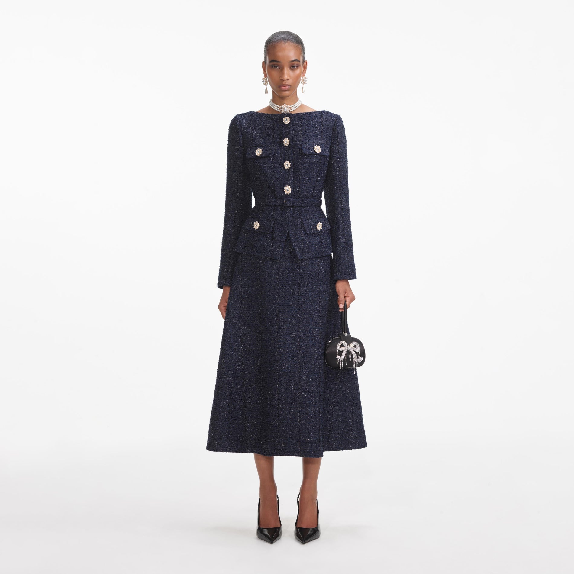 Front view of a woman wearing the Navy Metallic Boucle Midi Dress