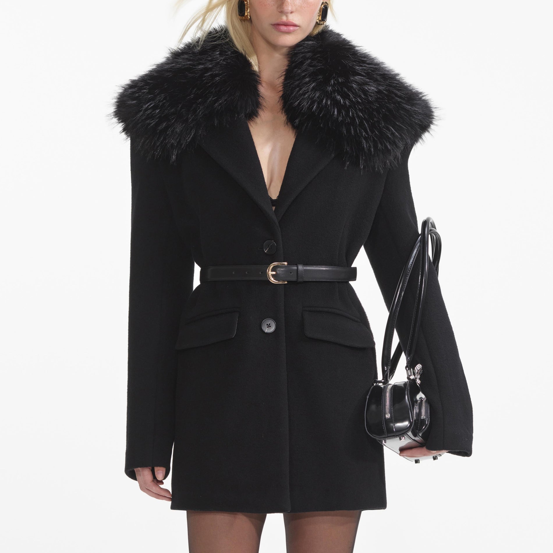 A close up of a woman wearing the Black Faux Fur Collar Coat