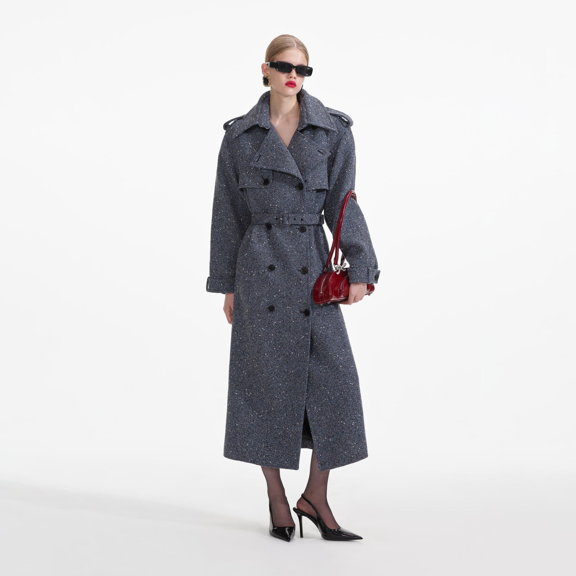 Front view of a woman wearing the Blue Boucle Trench Coat