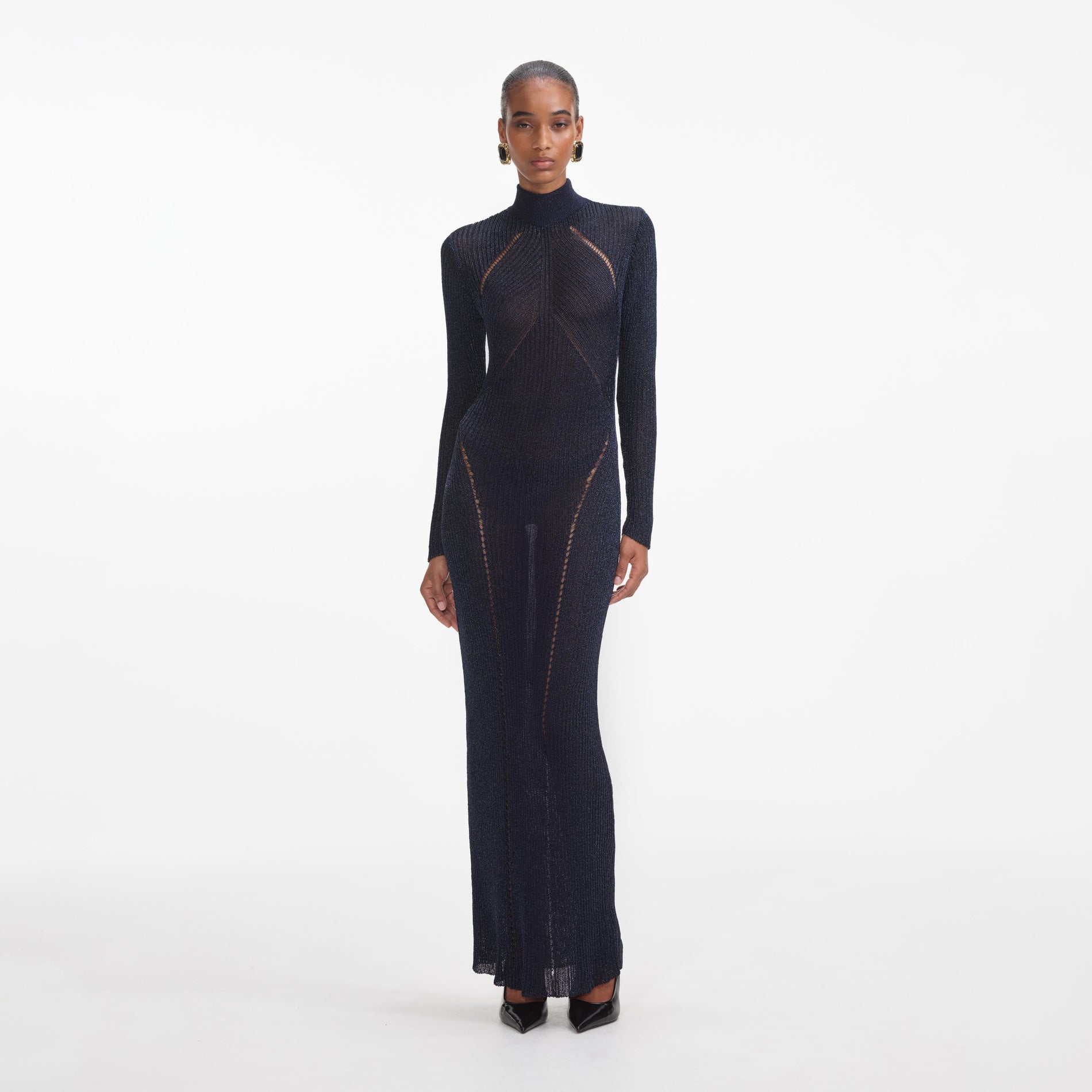 Front view of a woman wearing the Navy Lurex Knit Maxi Dress