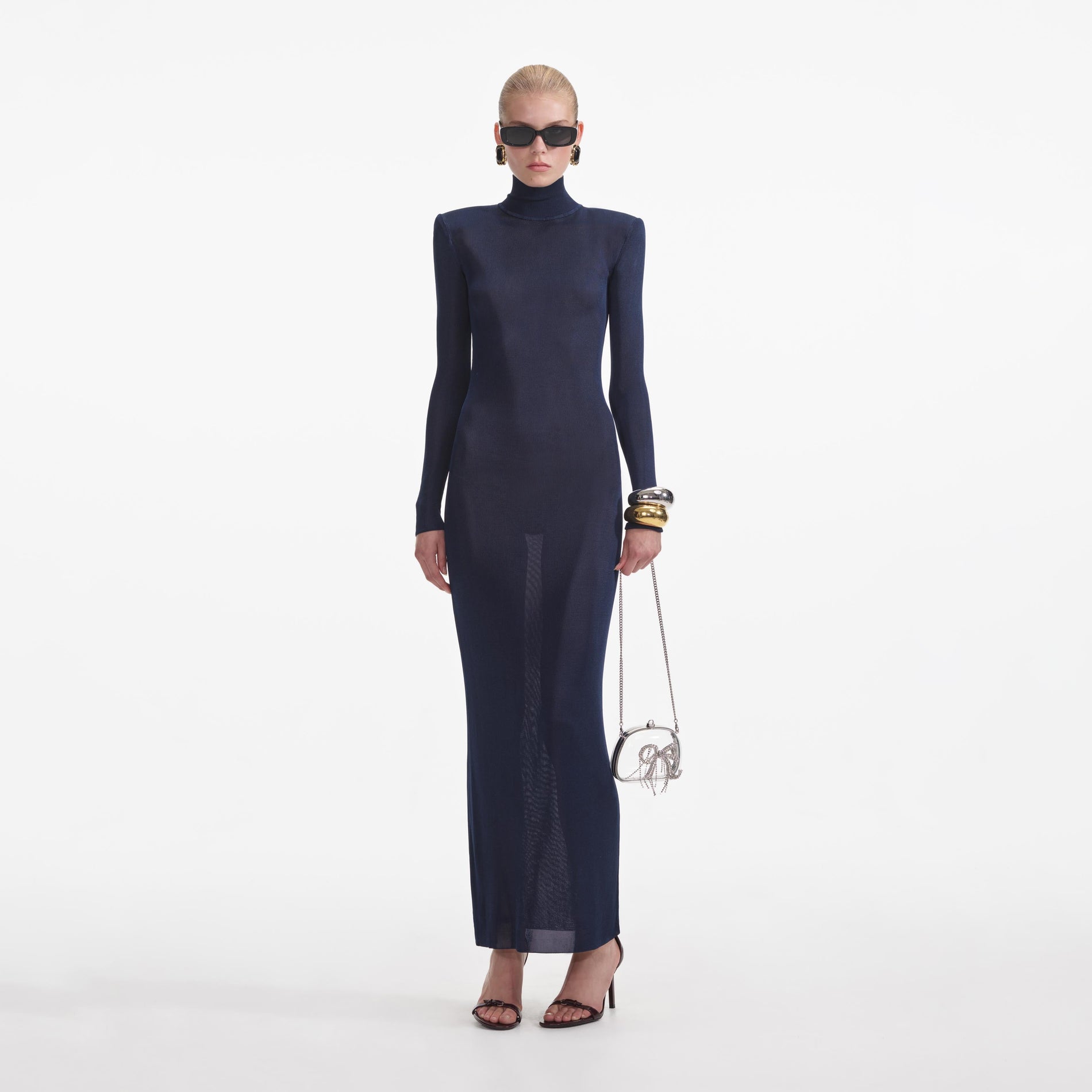 Front view of a woman wearing the Navy Viscose Knit Maxi Dress