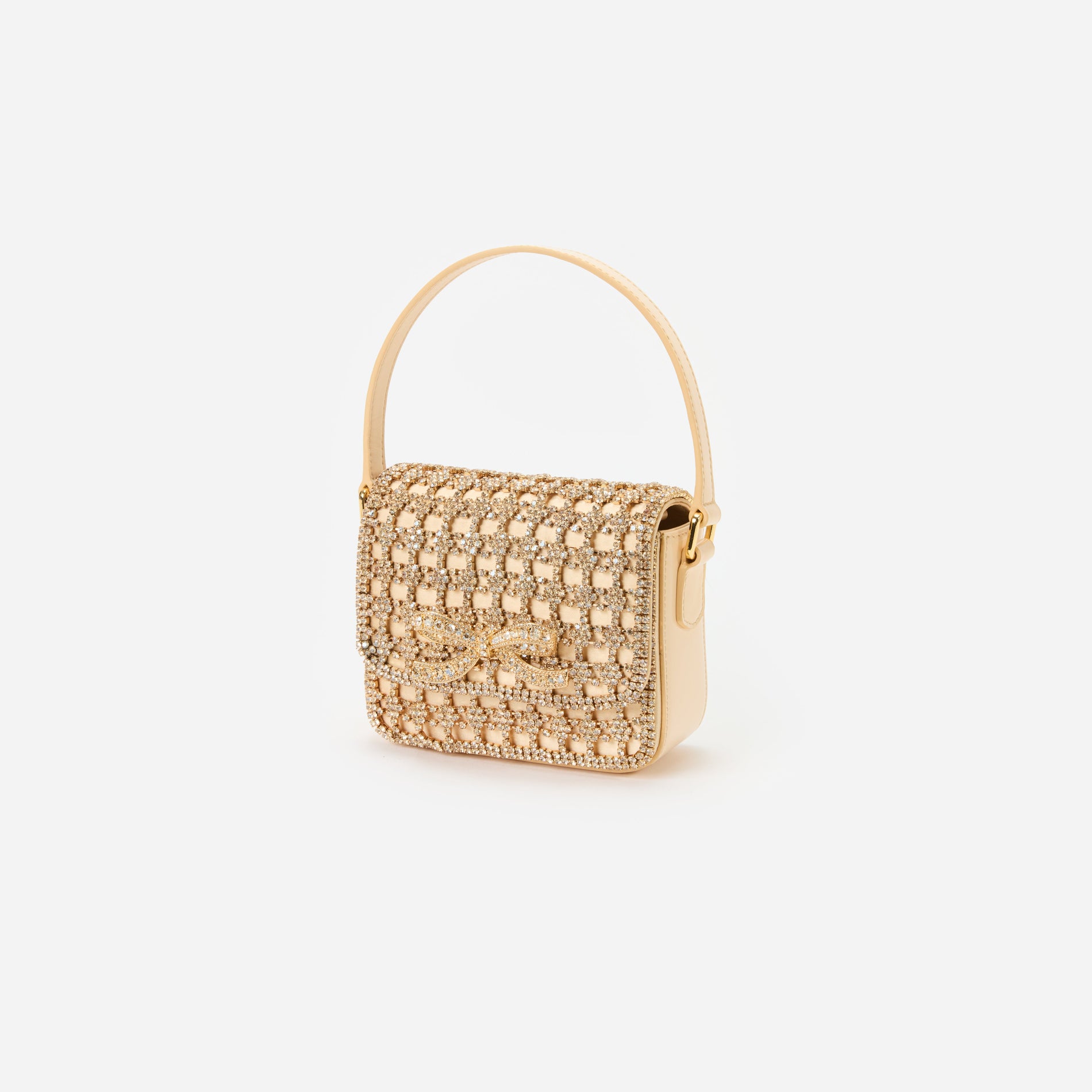 Side view of a woman wearing the Gold Crystal Micro Bag
