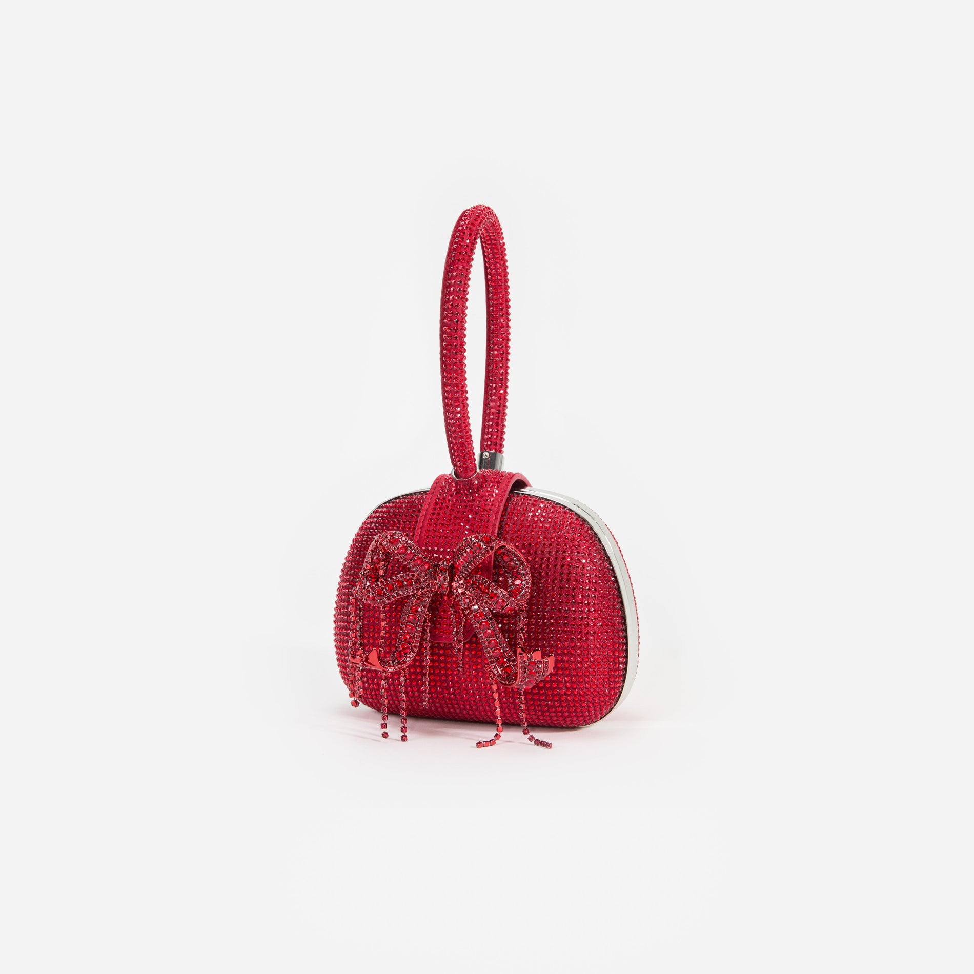 Side view of a woman wearing the Burgundy Rhinestone Top Handle Clutch Bag