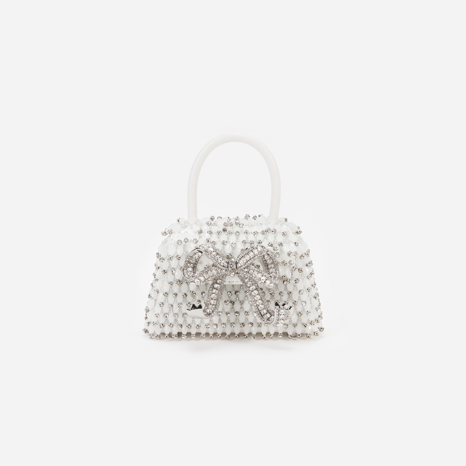 Front view of a woman wearing the White Embellished Micro Bow Bag