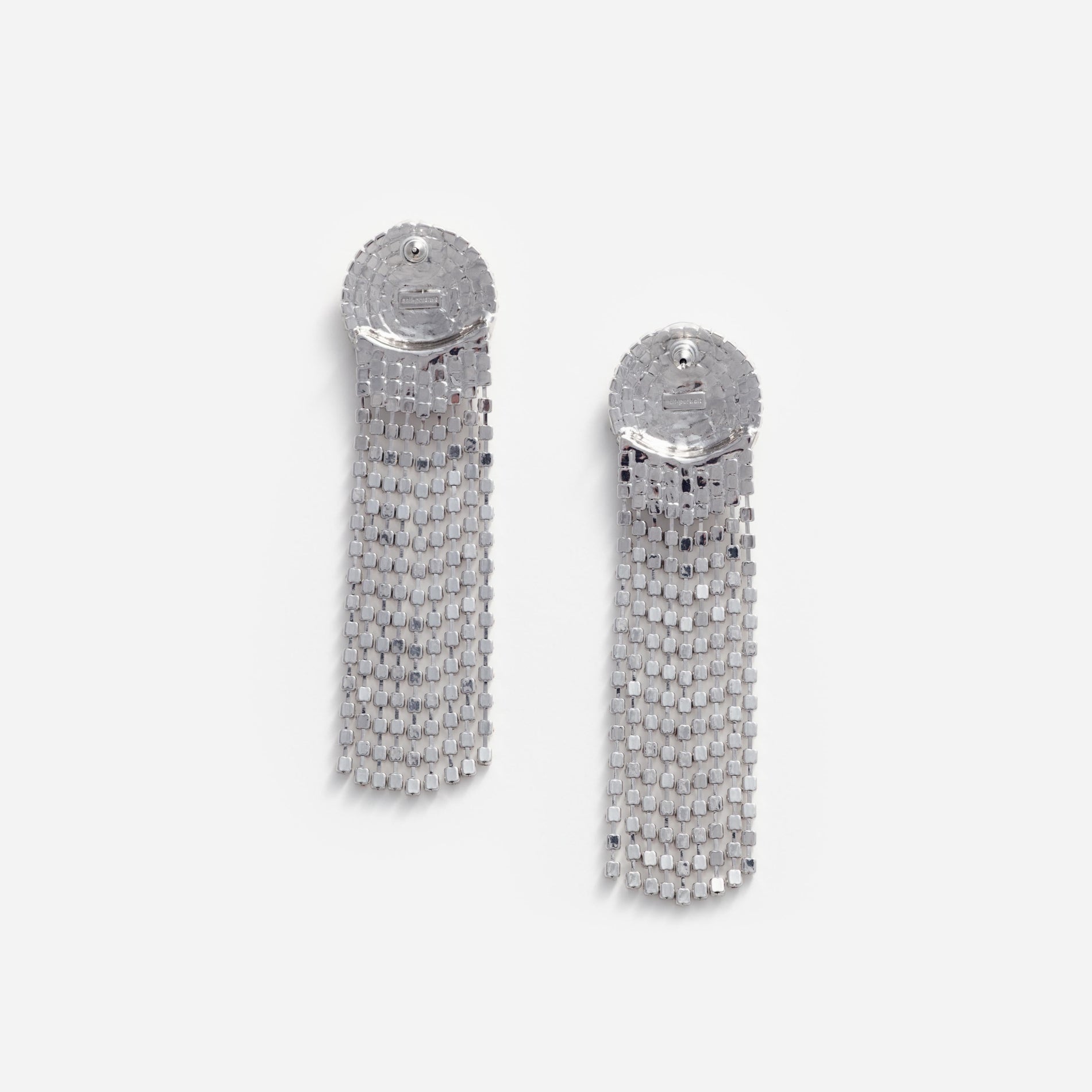 Side view of a woman wearing the Round Crystal Droplet Earrings