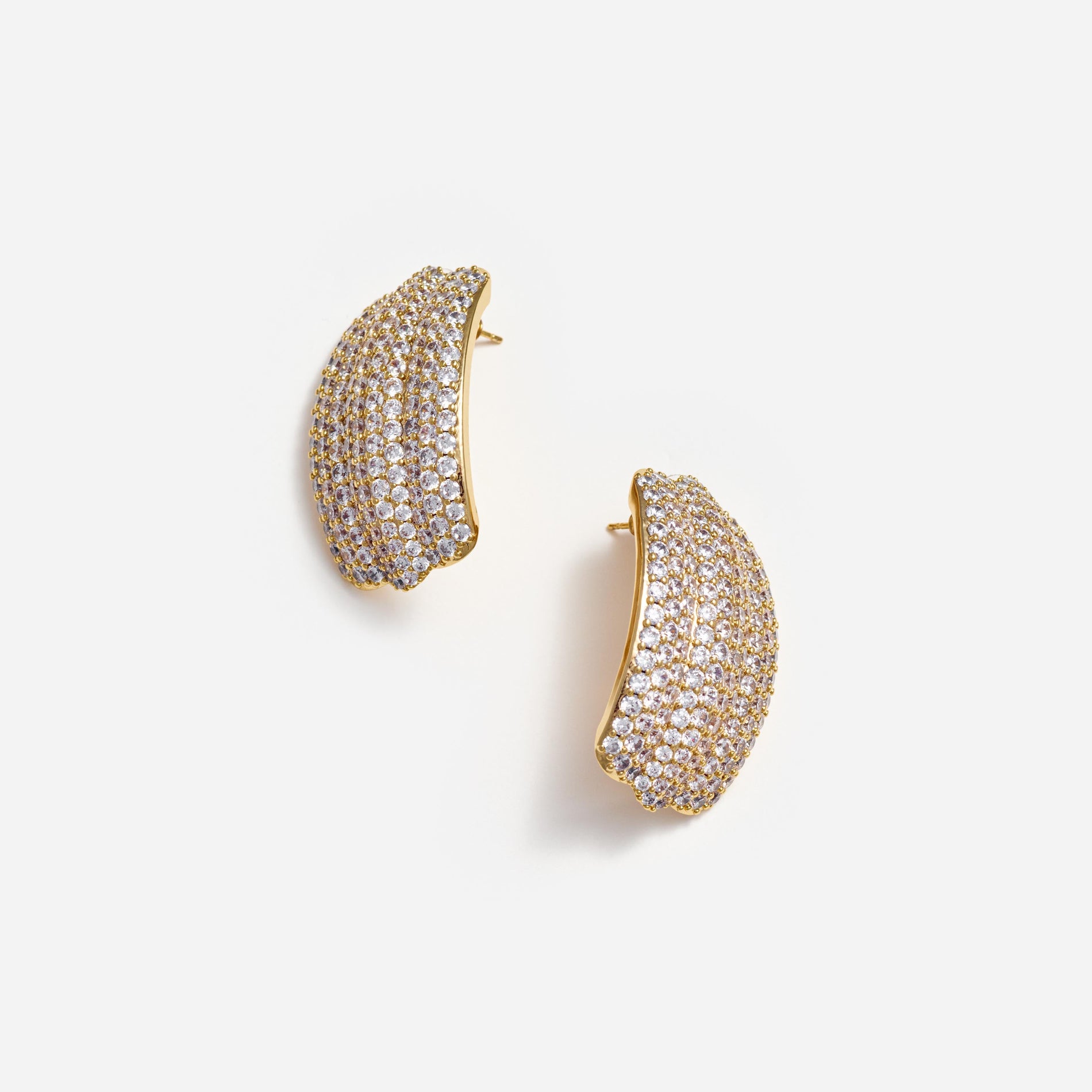 Side view of a woman wearing the Gold Crystal Ridged Earrings