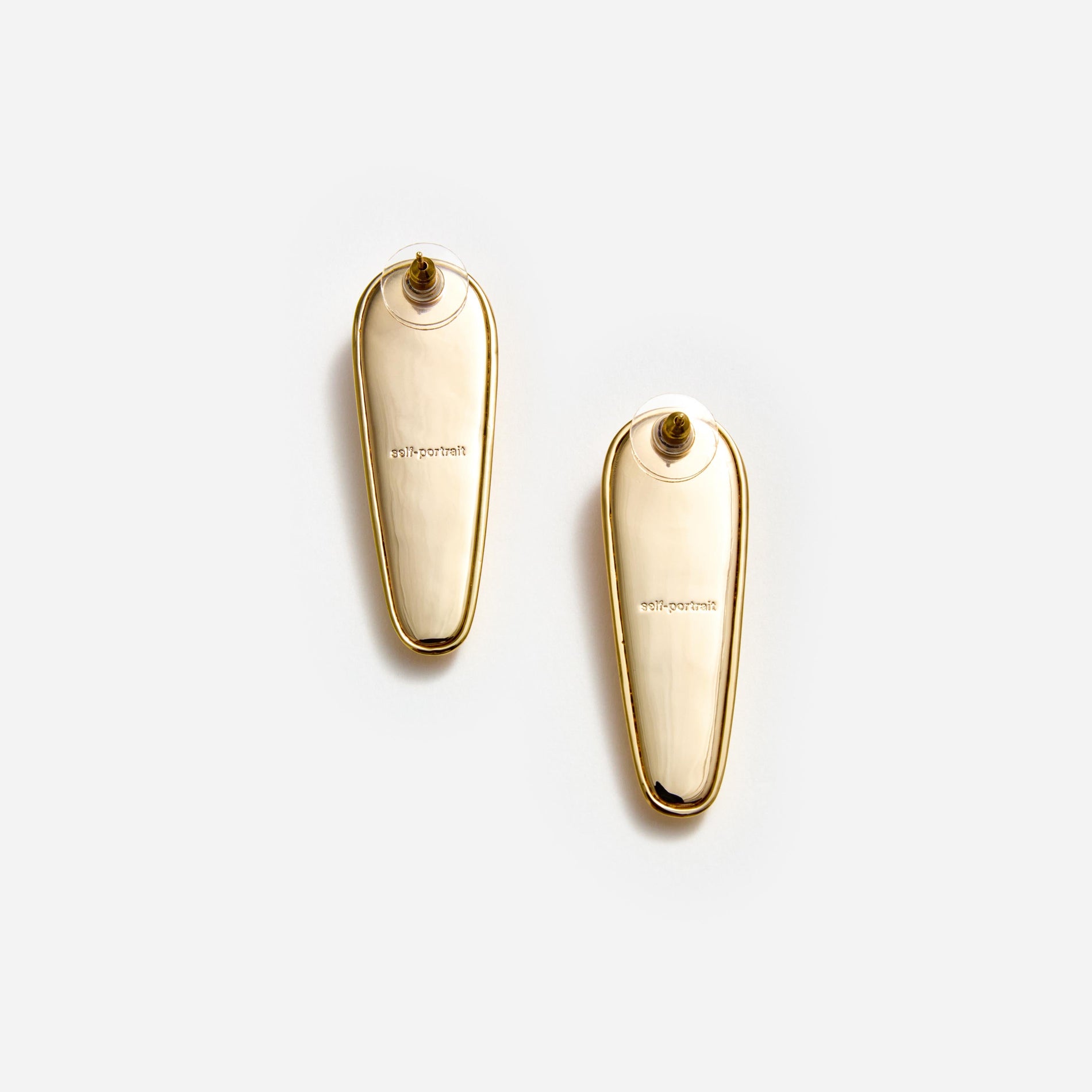 Side view of a woman wearing the Gold Bar Earrings