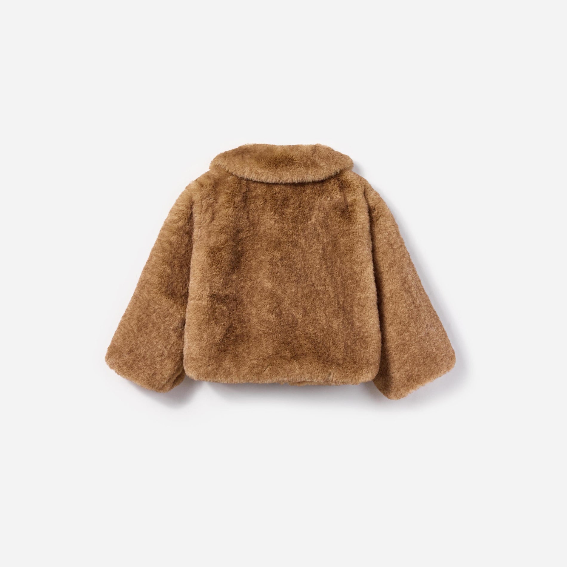 Side view of a woman wearing the Brown Faux Fur Jacket