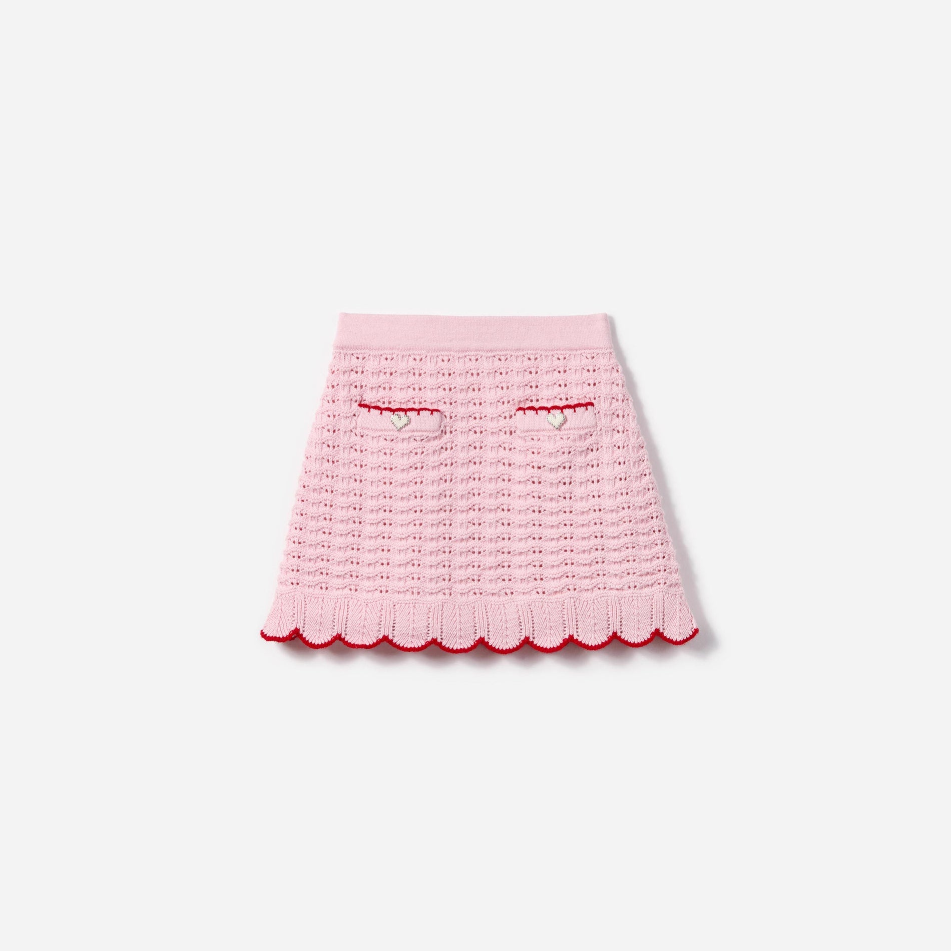 Front view of a woman wearing the Pink Textured Knit Heart Detail Skirt