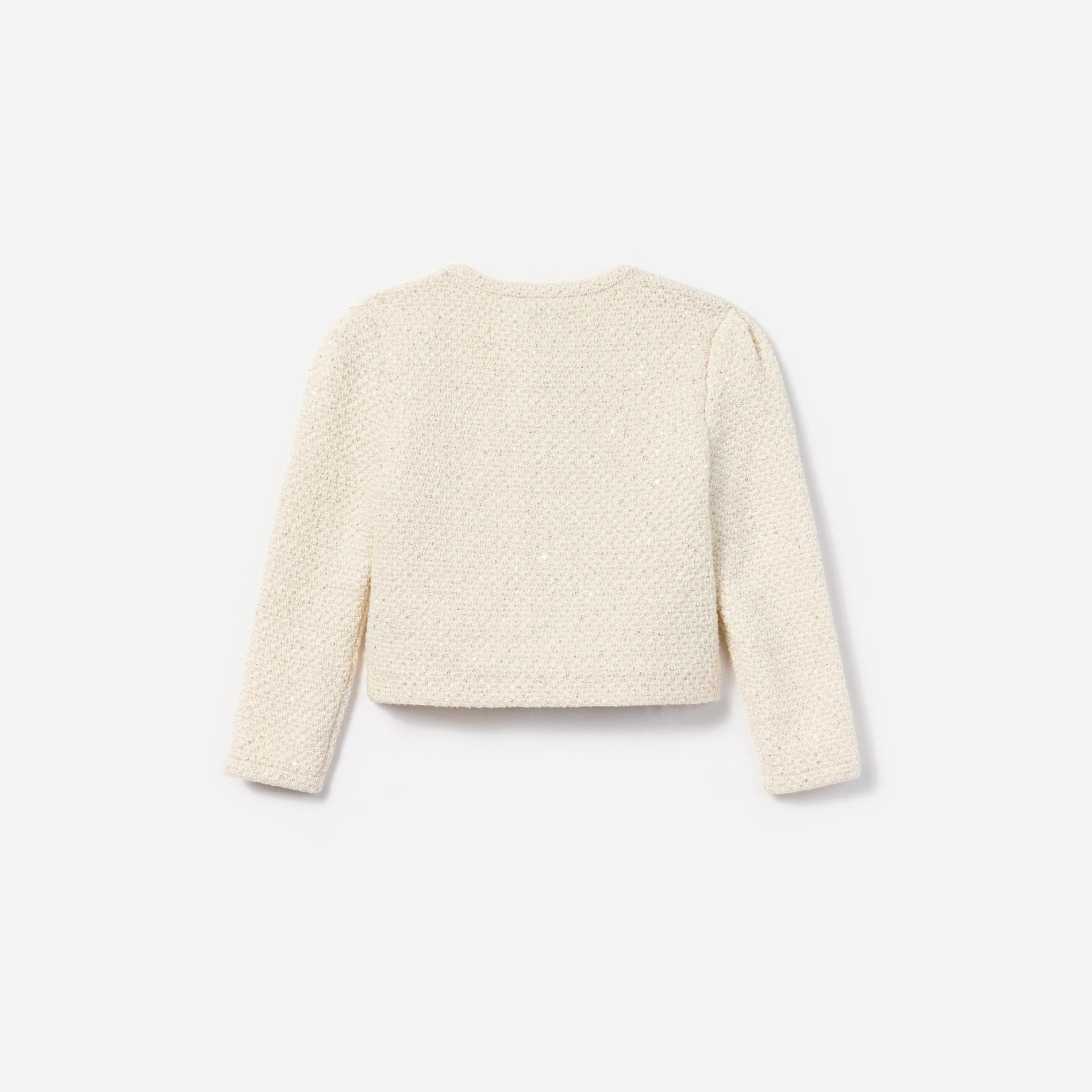 Side view of a woman wearing the Cream Sequin Cardigan