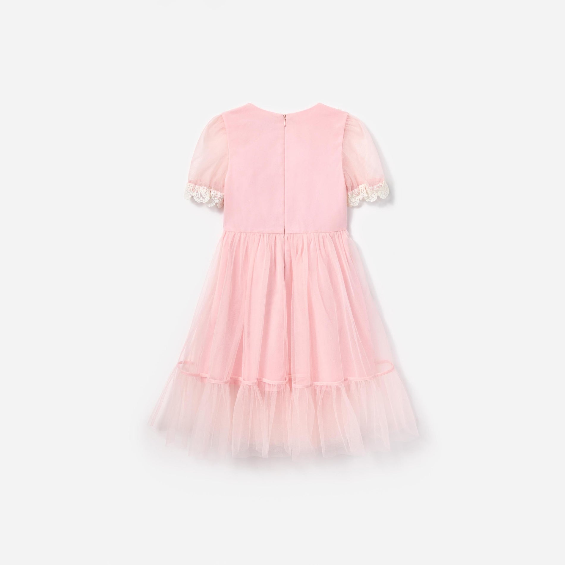 Side view of a woman wearing the Pink Tulle Dress