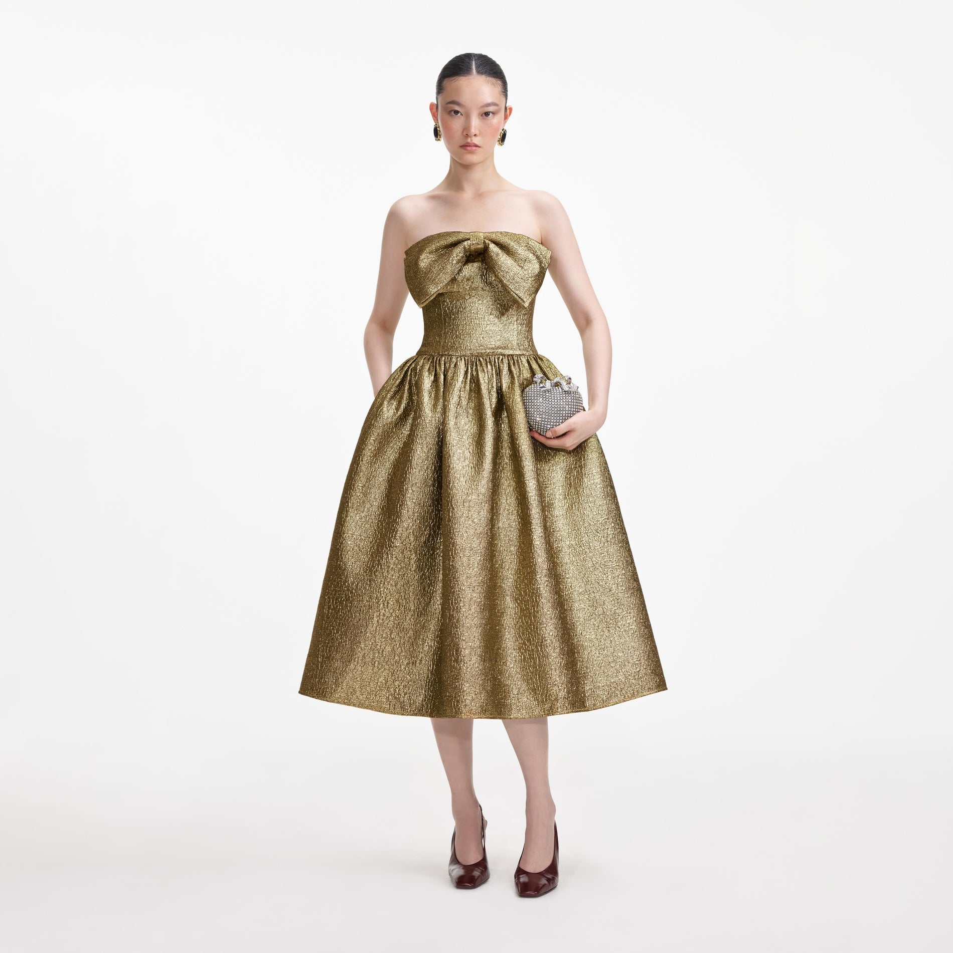 Front view of a woman wearing the Gold Metallic Jacquard Midi Dress