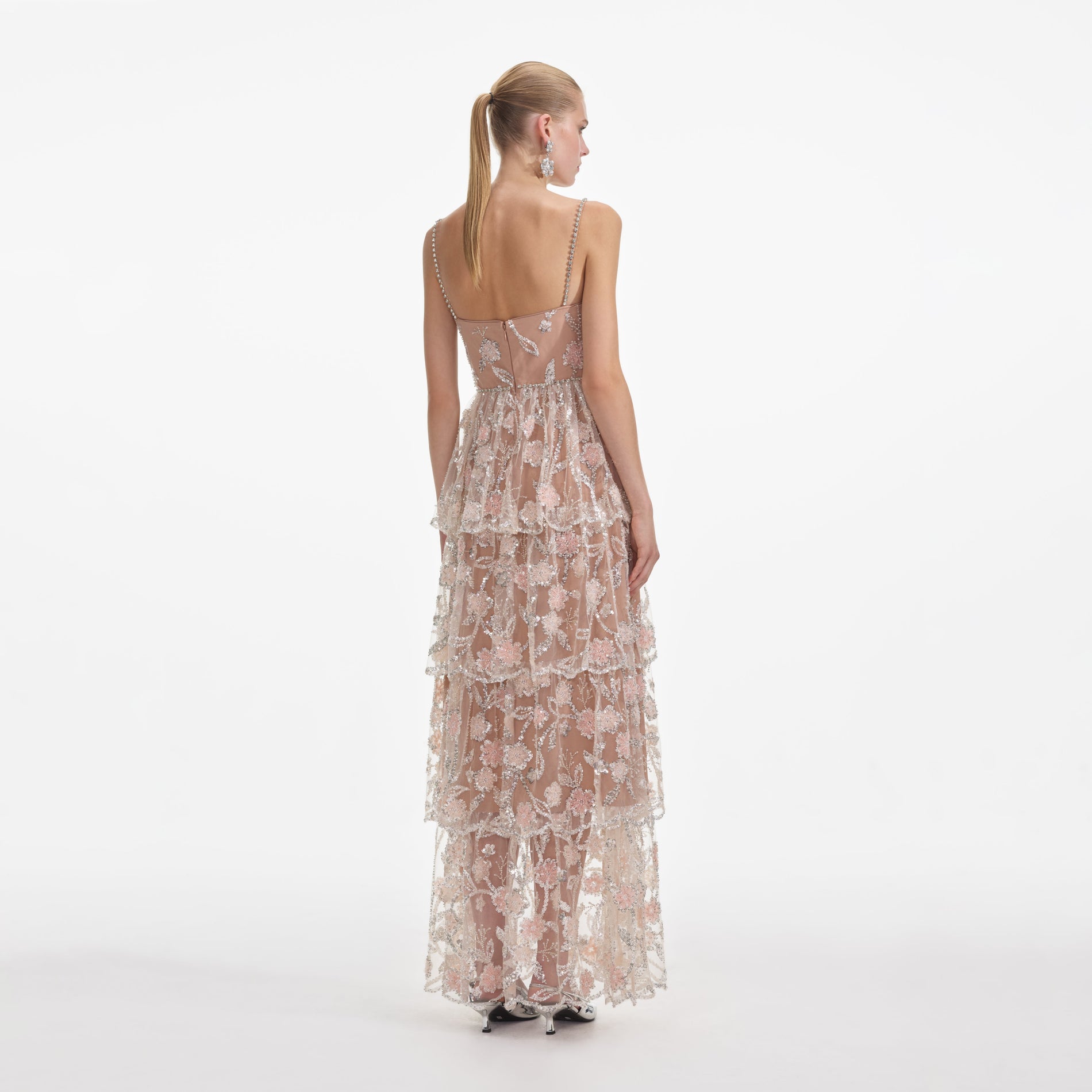 Back view of a woman wearing the Flower Sequin Tier Maxi Dress