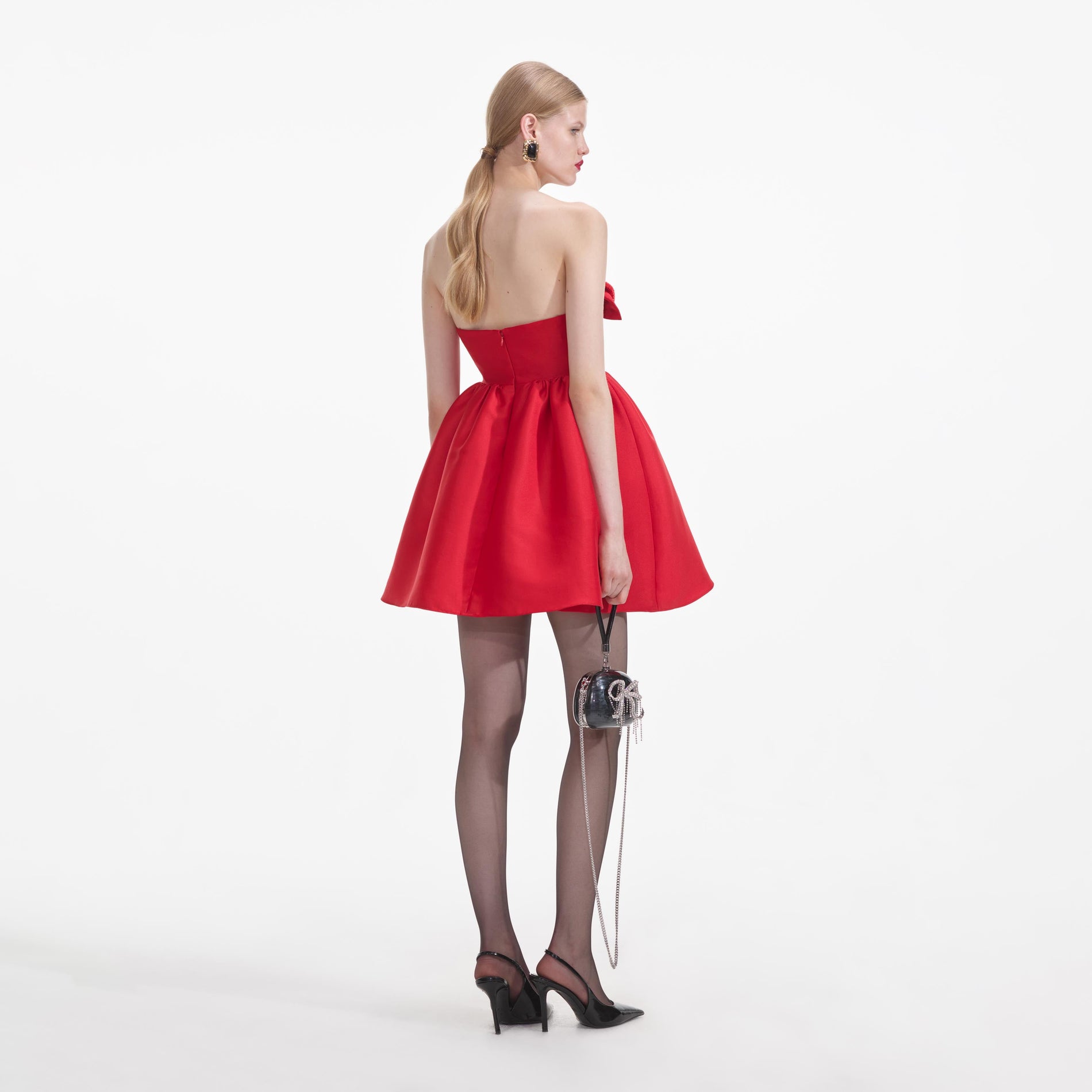 Back view of a woman wearing the Red Taffeta Bandeau Mini Dress