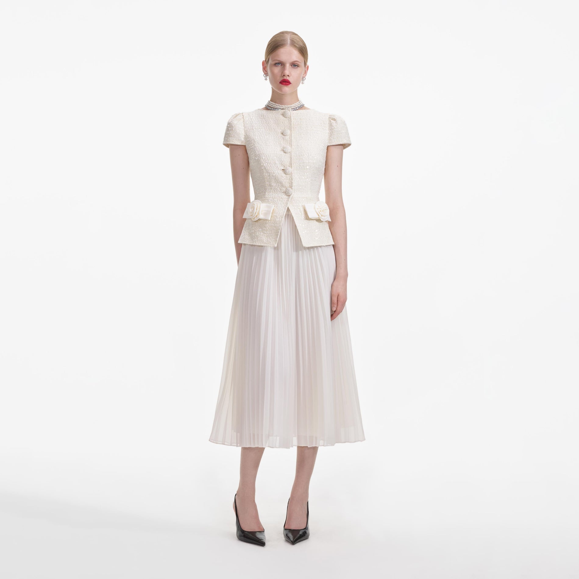 Front view of a woman wearing the Cream Boucle Bow Detail Midi Dress