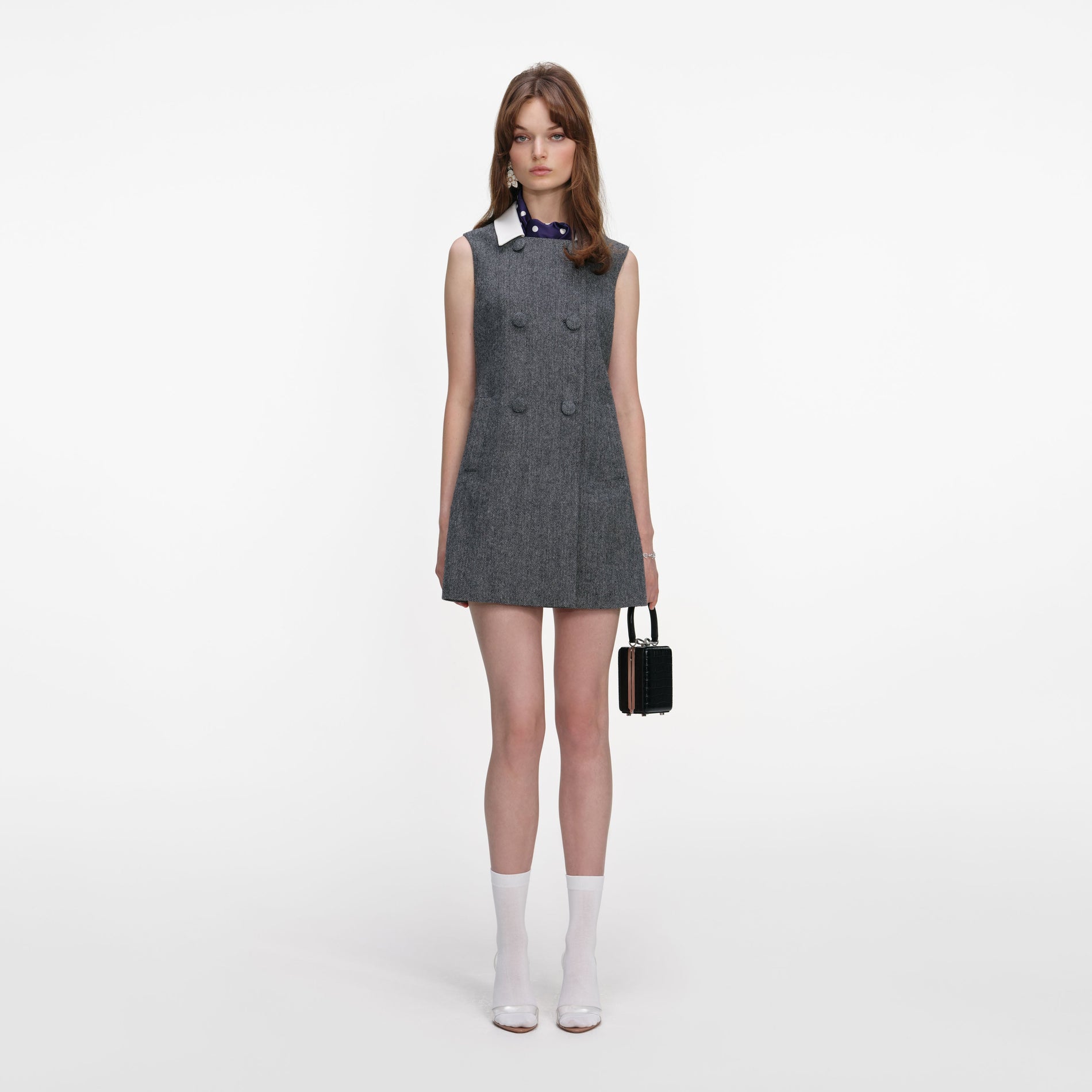 Front view of a woman wearing the Grey Herringbone Scarf Detail Mini Dress