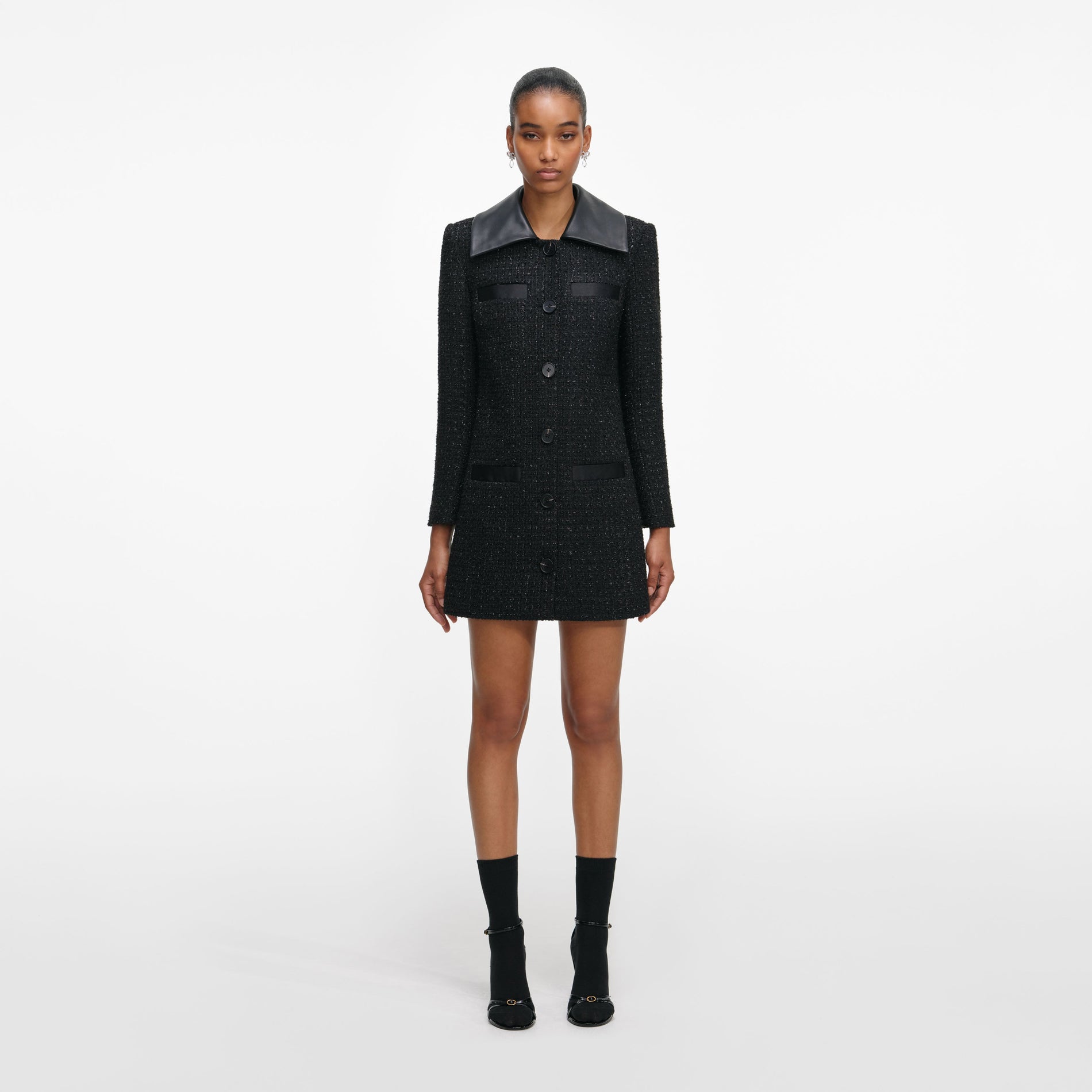 A close up of a woman wearing the Black Boucle Contrast Collar Mini Dress