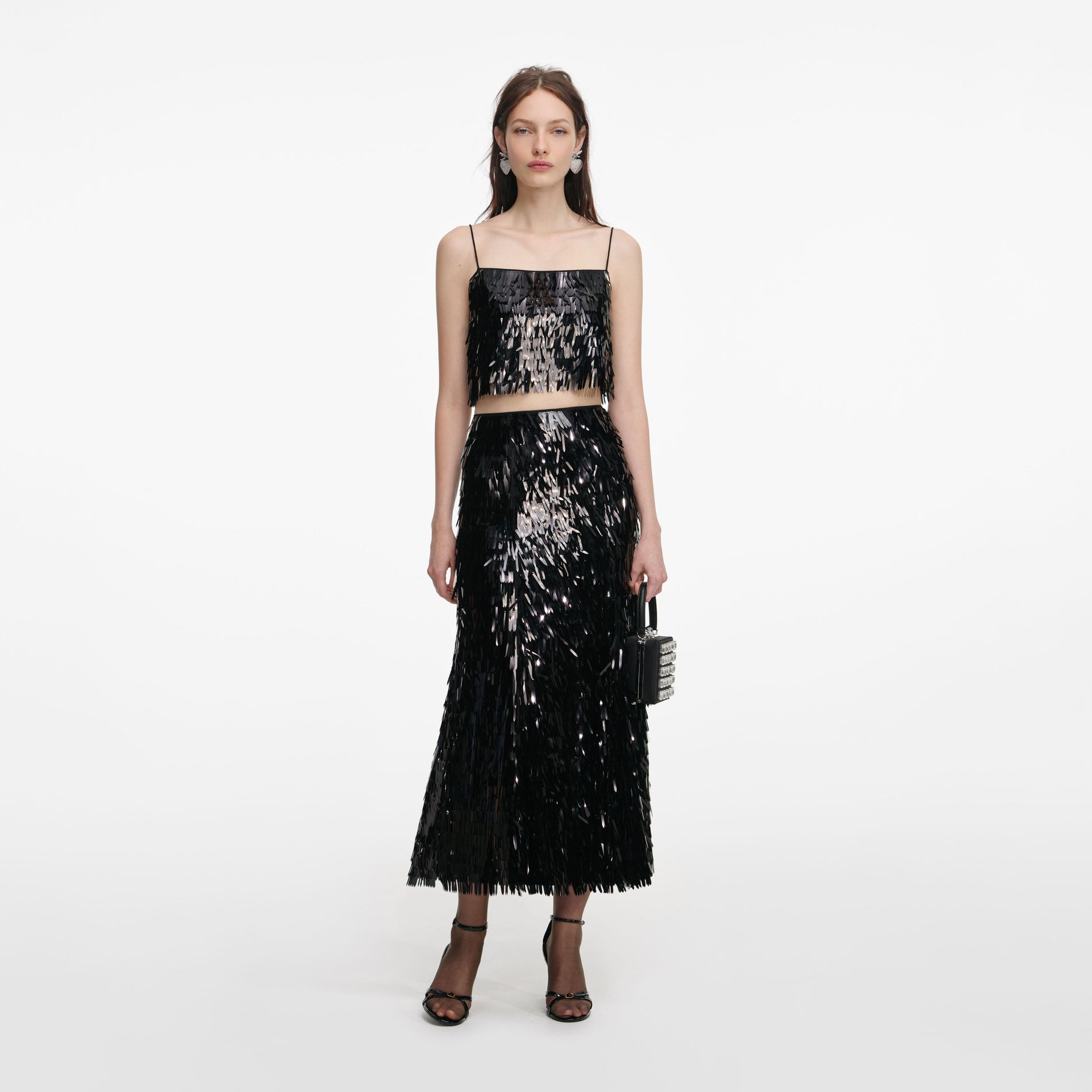 Front view of a woman wearing the Black Sequin Top