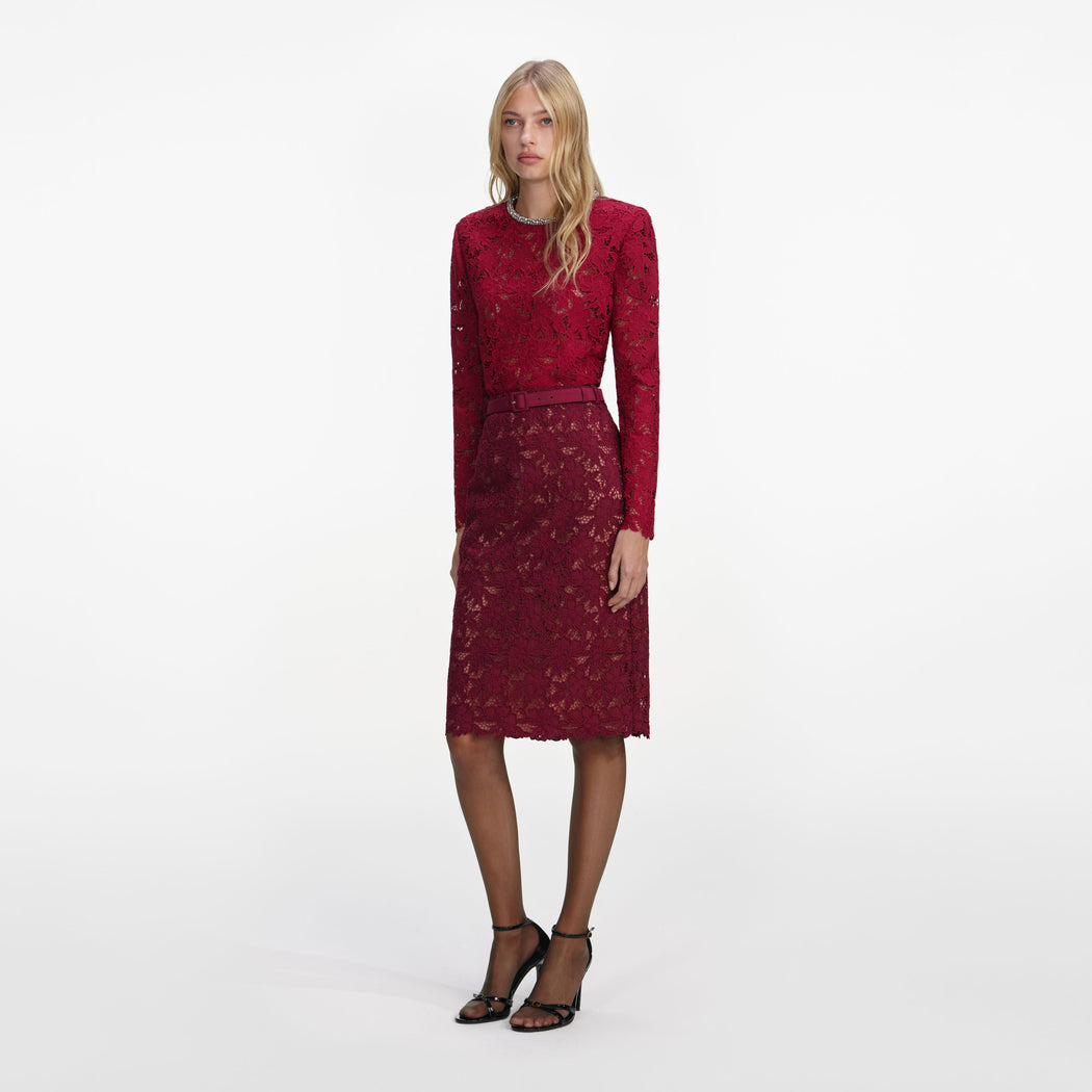 Side view of a woman wearing the Burgundy Lace Crystal Top