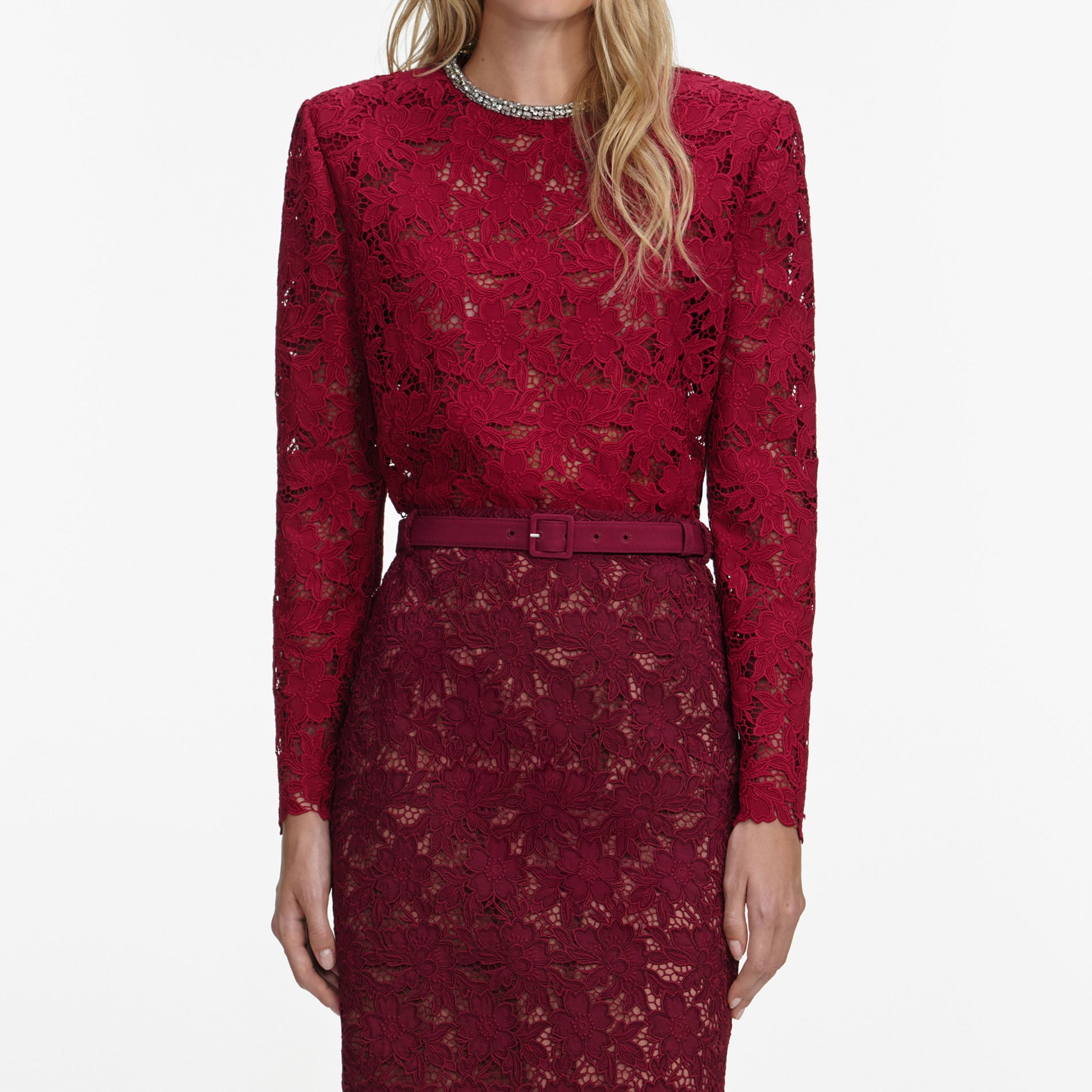 A close up of a woman wearing the Burgundy Lace Crystal Top