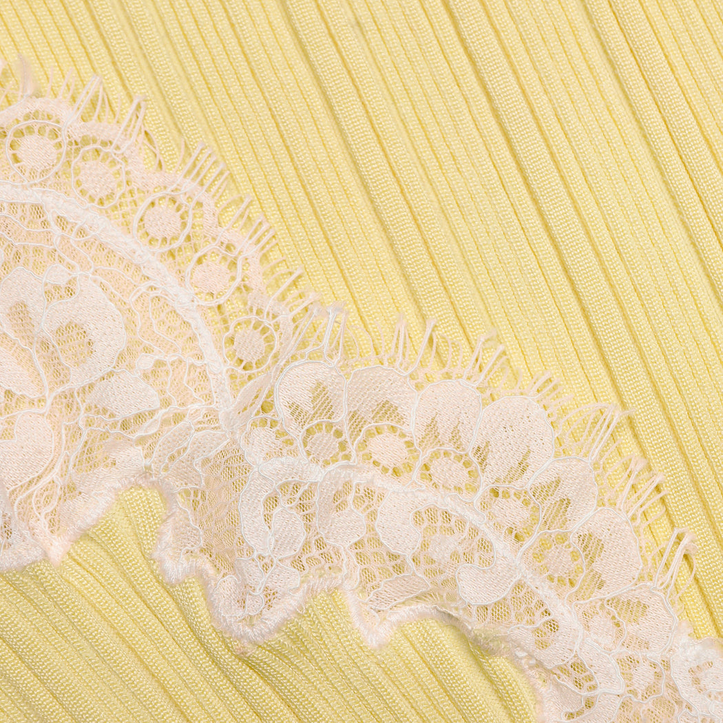 A close up of the fabric for the Yellow Contrast Lace Knit Top