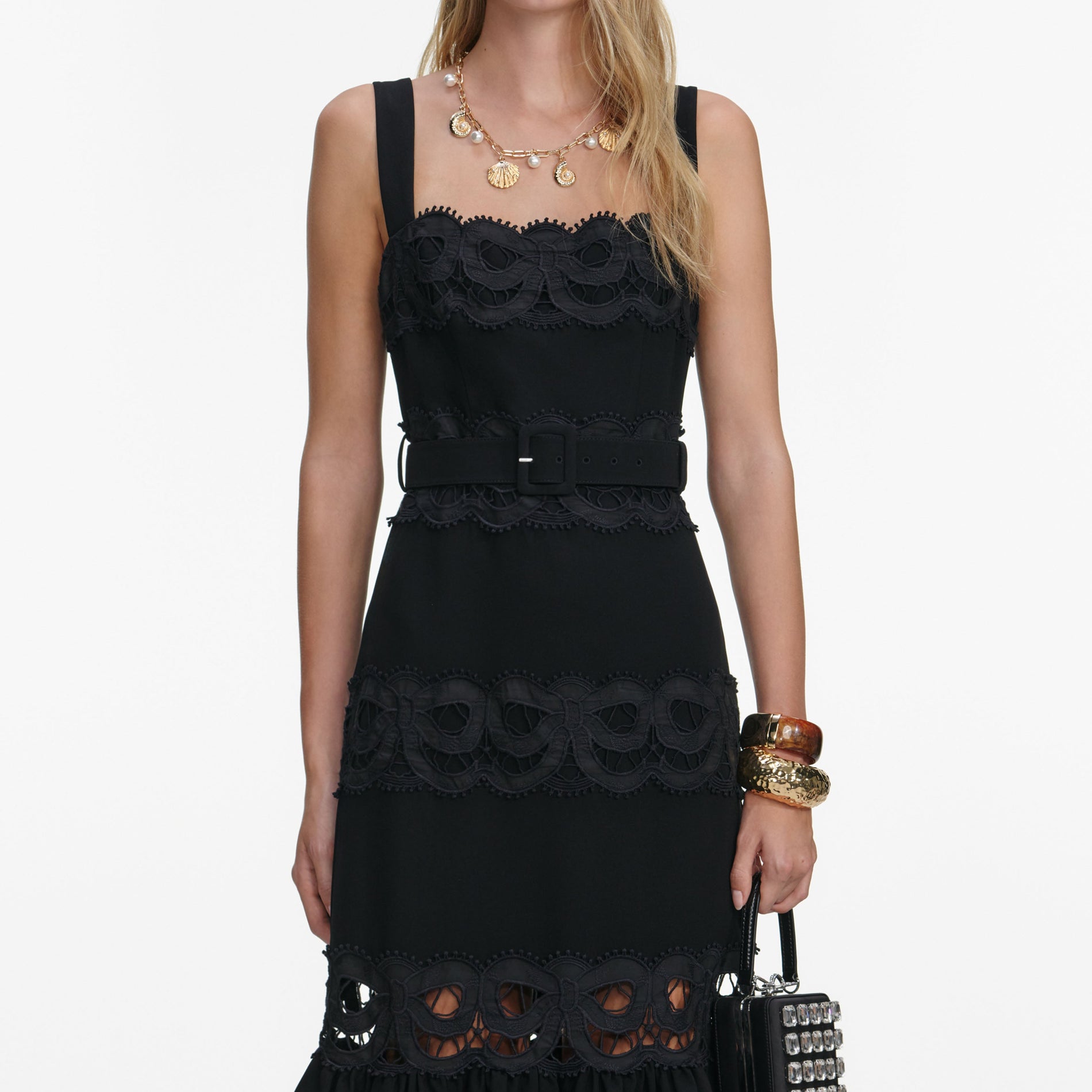A close up of a woman wearing the Black Crepe Midi Dress