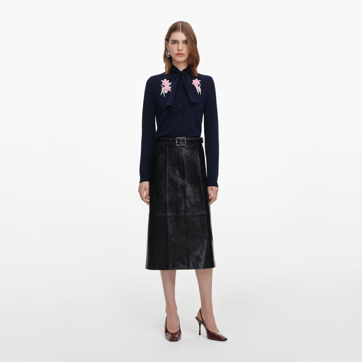 Front view of a woman wearing the Navy Sequin Embellished Knit Cardigan