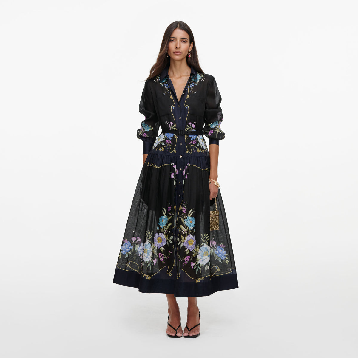 Front view of a woman wearing the Navy Floral Organza Midi Dress
