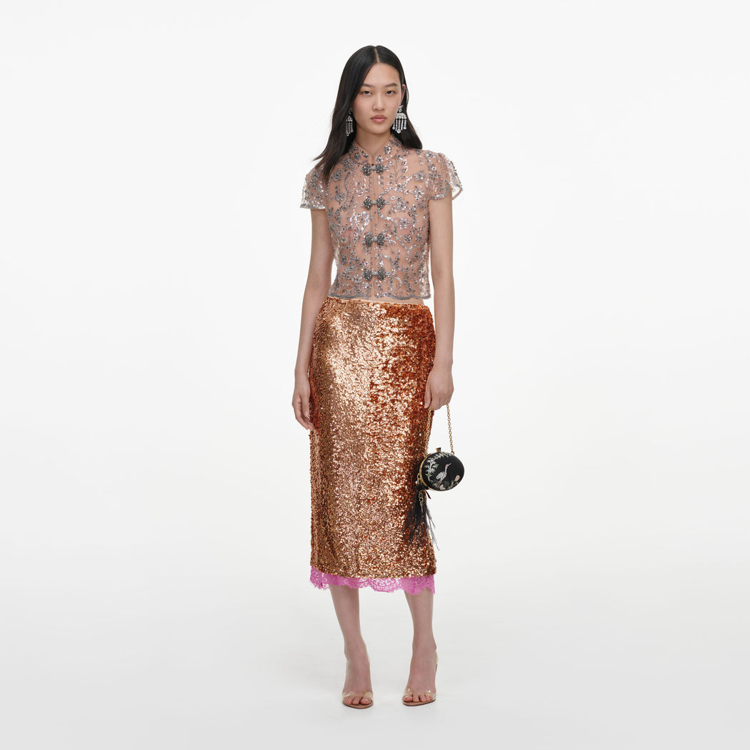Front view of a woman wearing the Silver Sequin Embellished Top