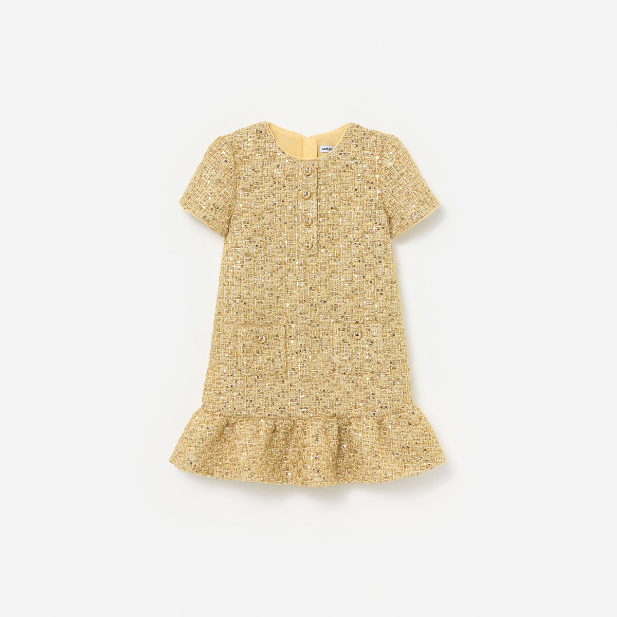 Front view of a girl wearing the Gold Boucle Dress