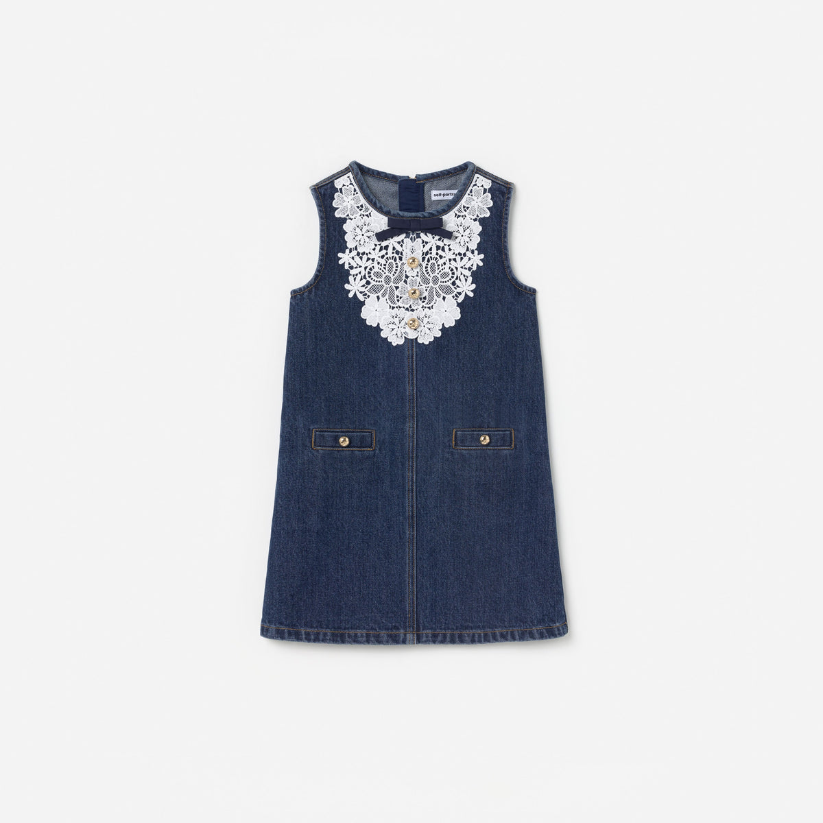 Front view of a girl wearing the Blue Denim Lace Bib Dress