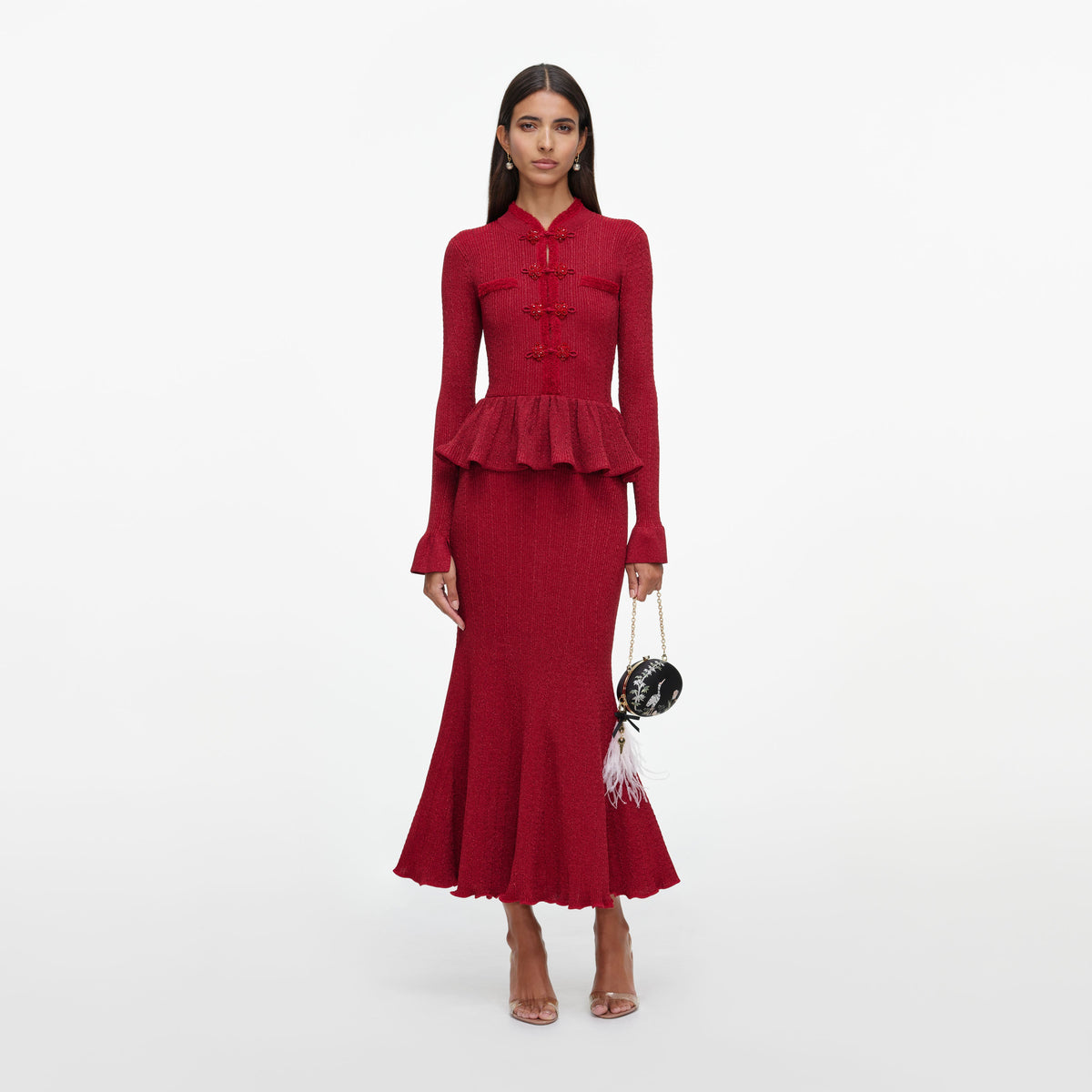 Front view of a woman wearing the Red Metallic Peplum Knit Midi Dress