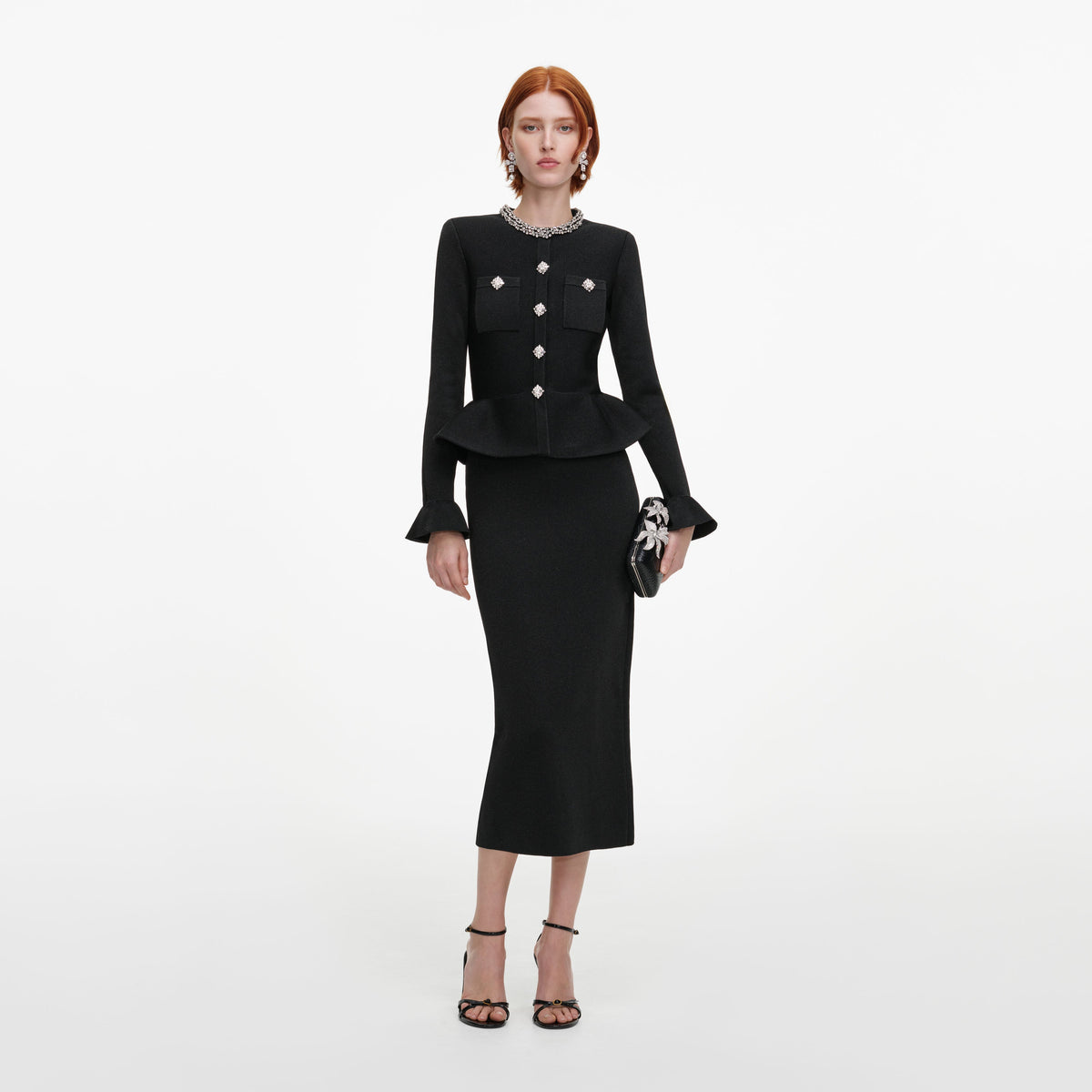 Front view of a woman wearing the Black Crystal Trim Knit Midi Dress