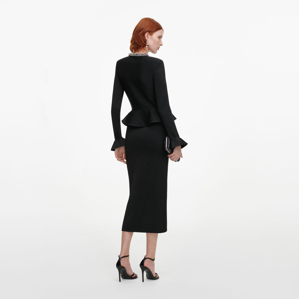 Back view of a woman wearing the Black Crystal Trim Knit Midi Dress