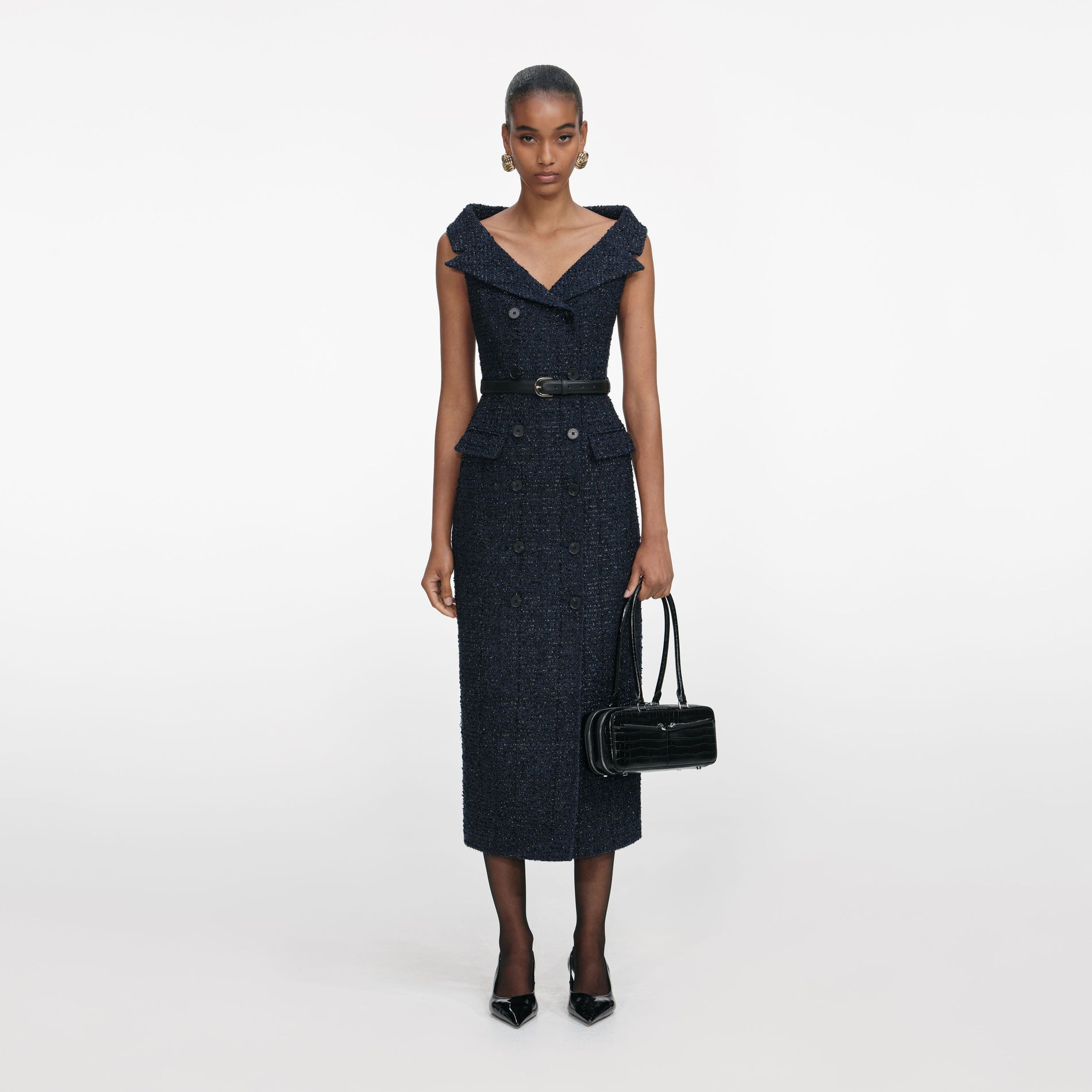 Front view of a woman wearing the Navy Boucle Midi Dress
