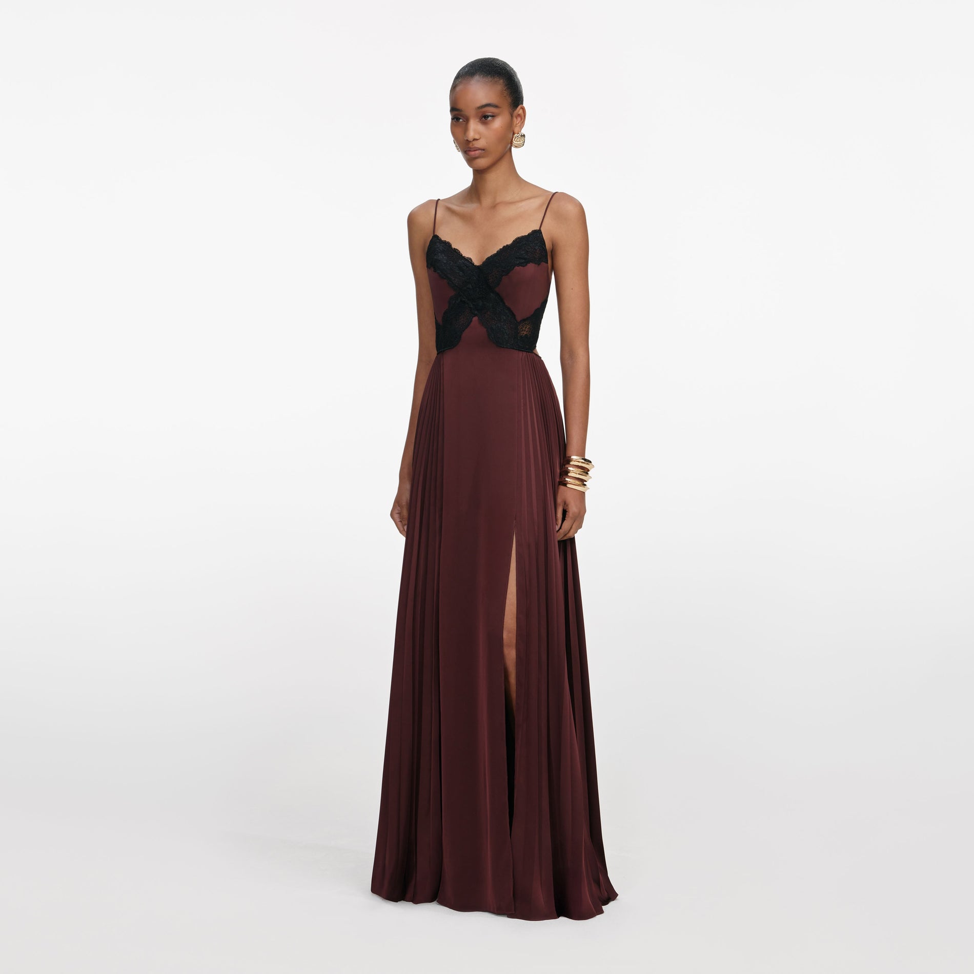Side view of a woman wearing the Brown Satin Lace Maxi Dress