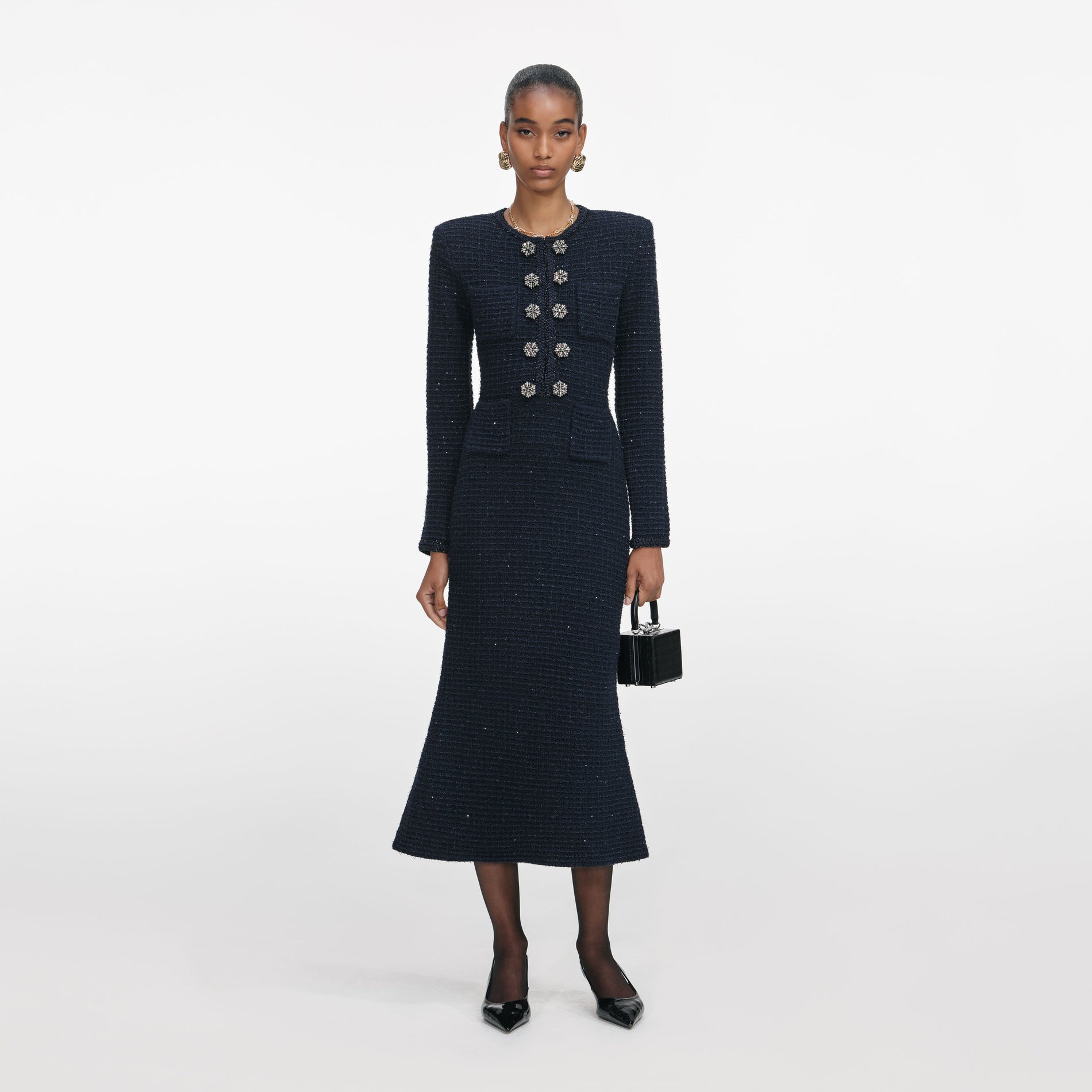 Front view of a woman wearing the Navy Textured Knit Midi Dress