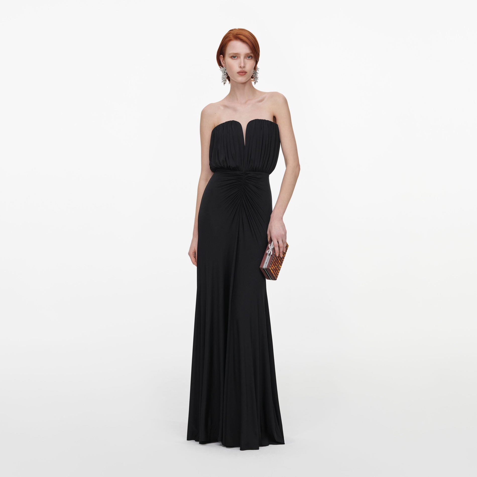 Front view of a woman wearing the Black Jersey Bandeau Maxi Dress