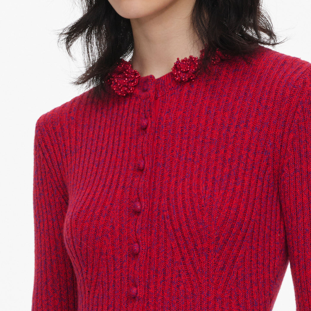 A close up of the fabric for the Red Flower Knit Playsuit
