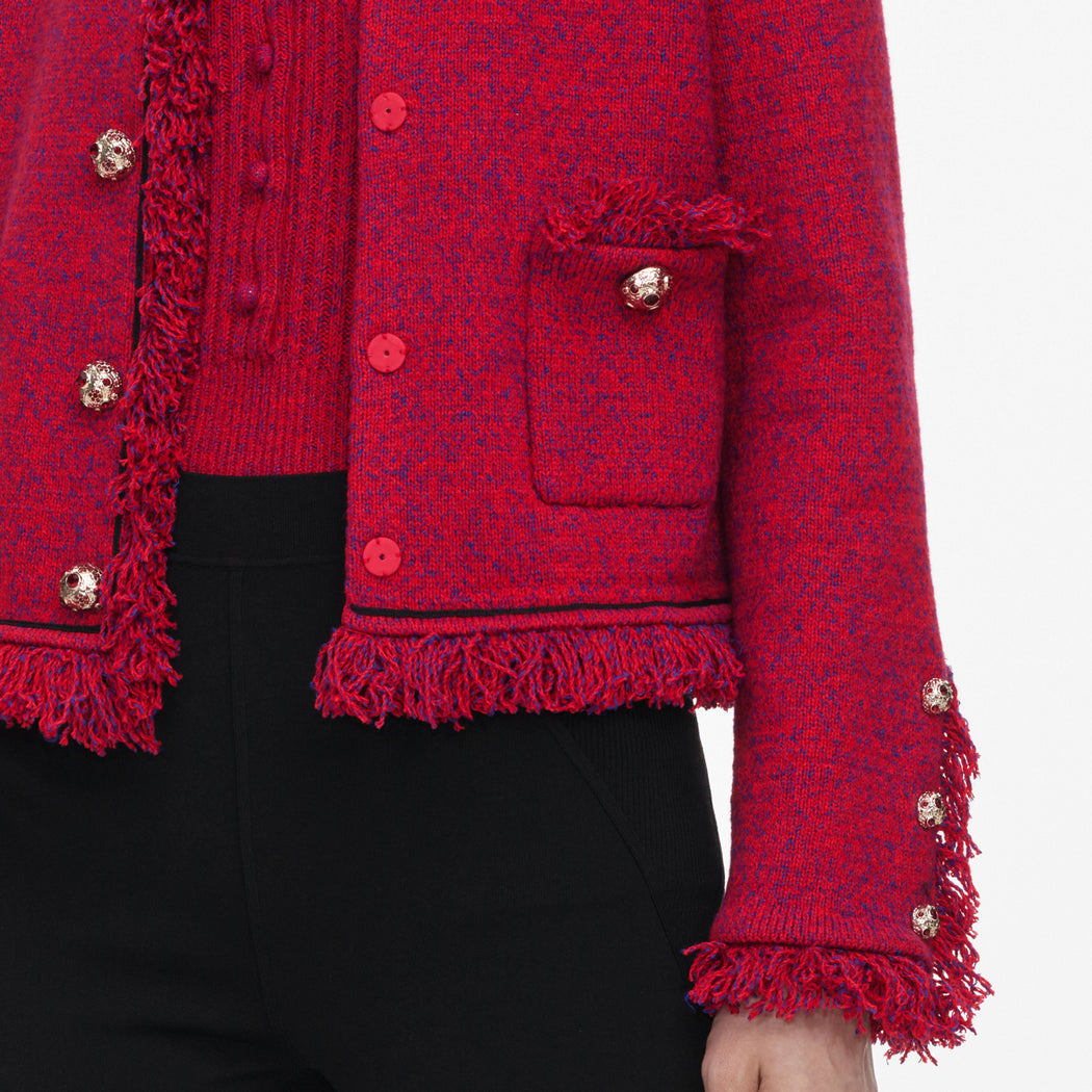 A close up of the fabric for the Red Frayed Knit Jacket